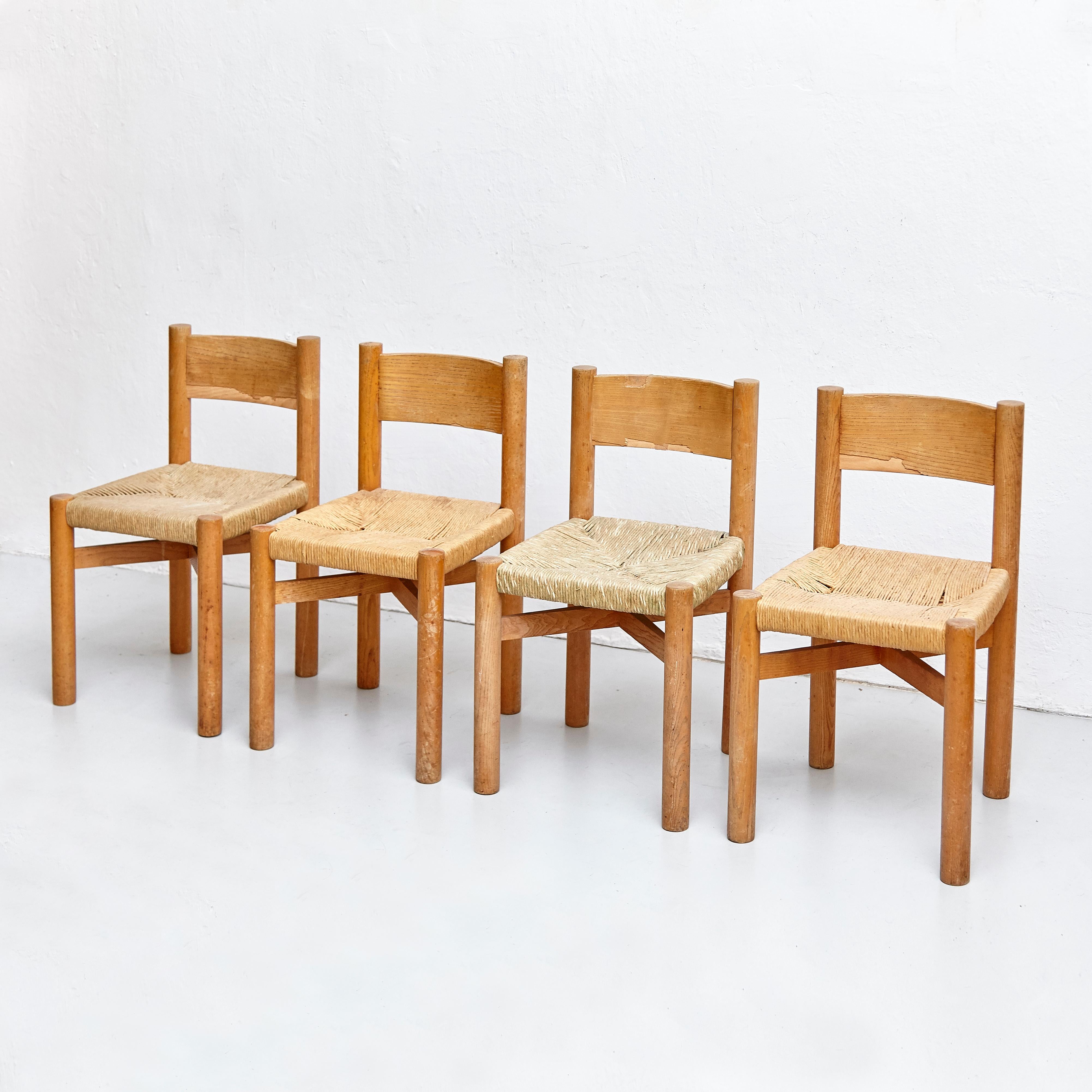 Set of 4 Charlotte Perriand Mid-Century Modern Wood Rattan Meribel French Chairs In Good Condition In Barcelona, Barcelona