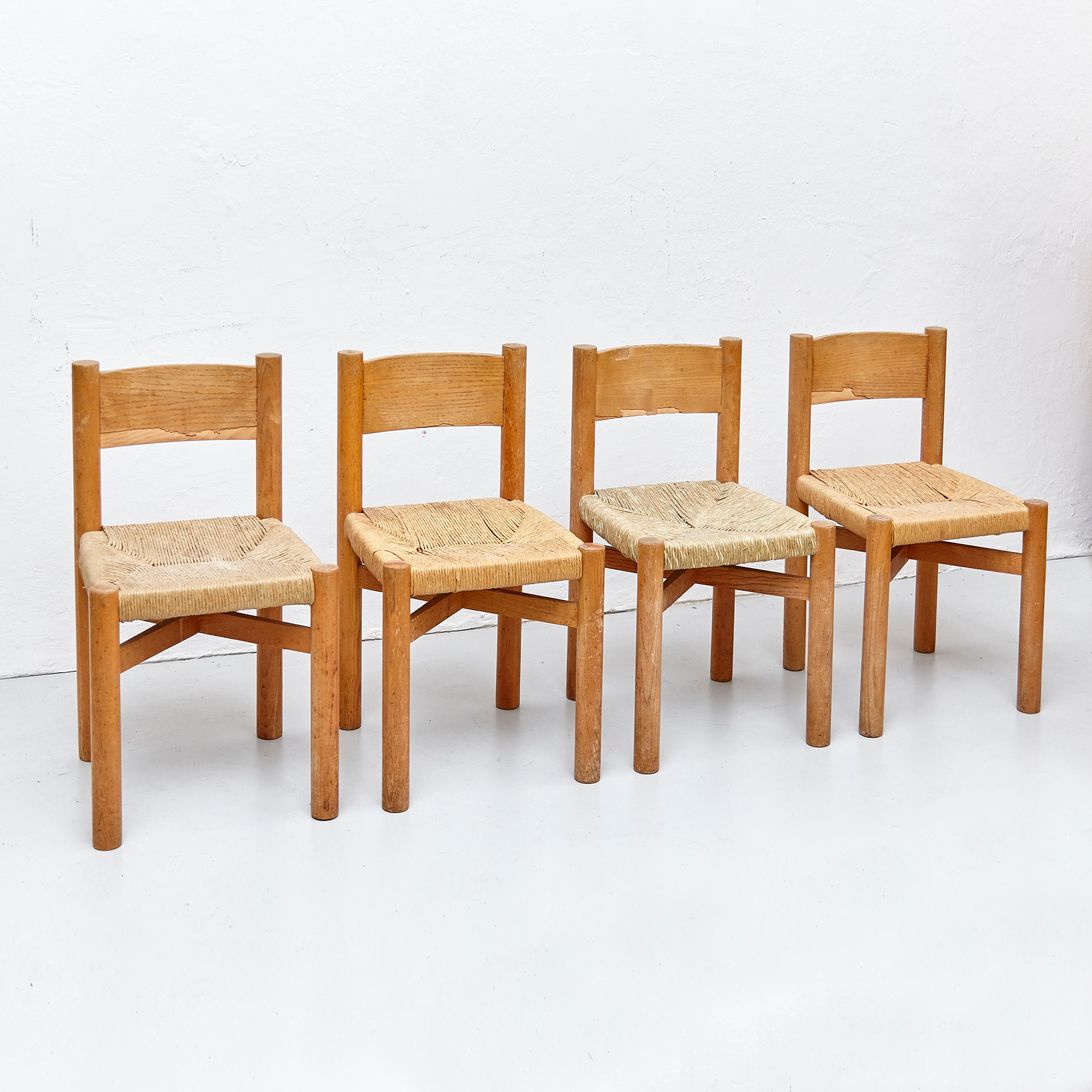 Mid-20th Century Set of 4 Charlotte Perriand Mid-Century Modern Wood Rattan Meribel French Chairs