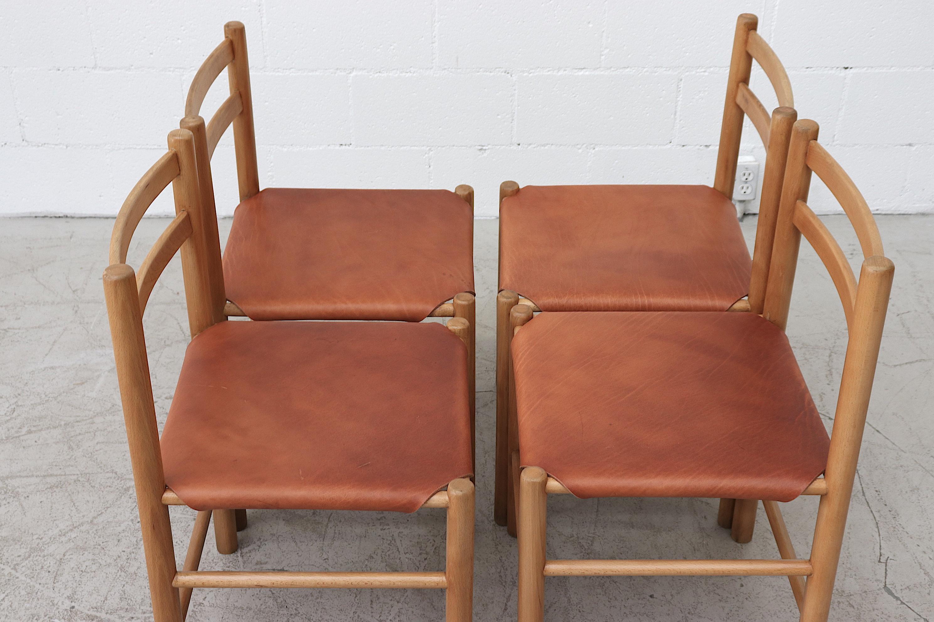 Charlotte Perriand style dining chairs with new natural leather tanned hide seats corseted on original birch wood frame. Set price.