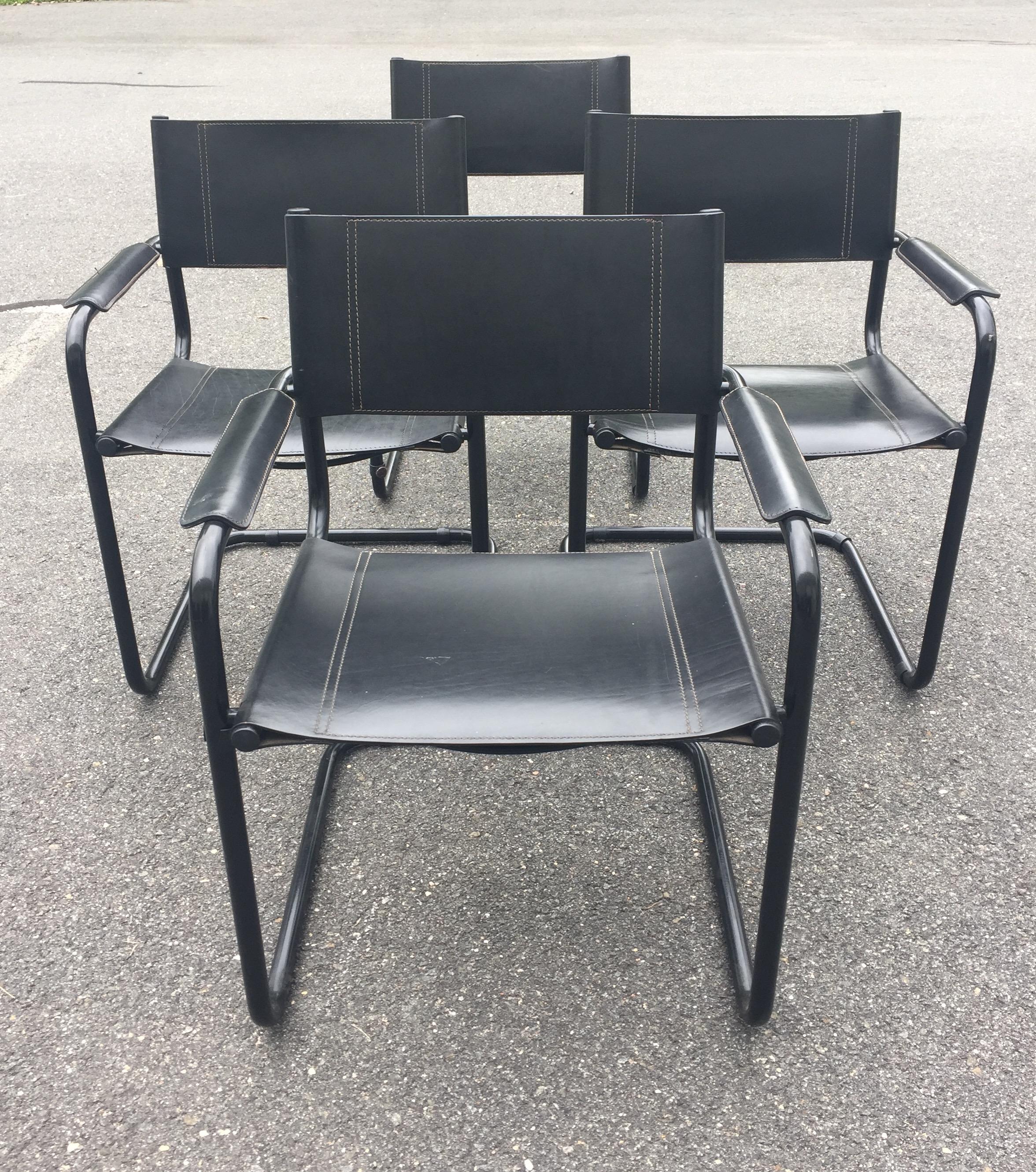 Schnazzy set of 4 Italian black leather and black painted metal Mid-Century Modern armchairs.
 