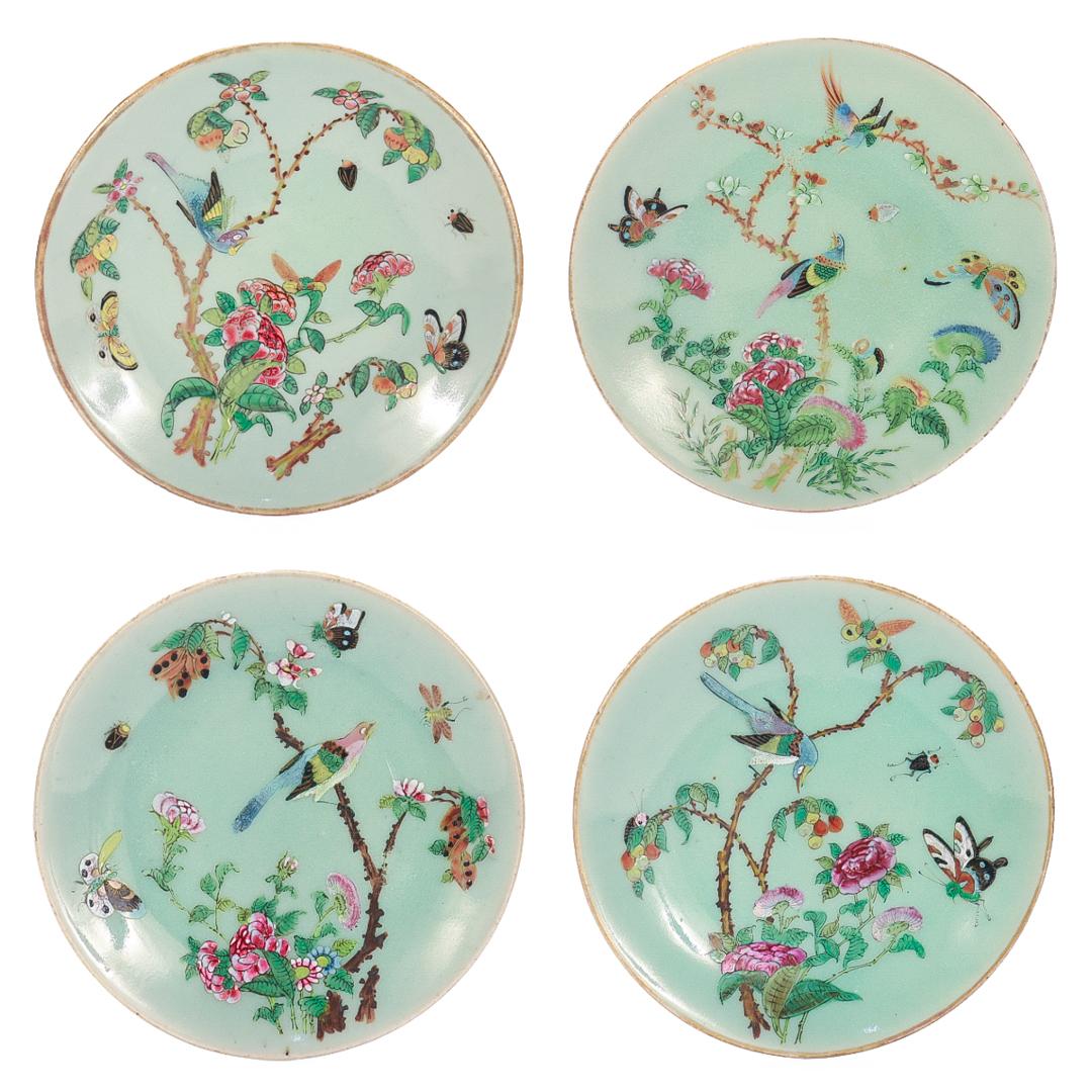 A fine set of 4 antique Chinese porcelain celadon plates.

Each with a raised depictions of birds, bugs, and butterflies surrounded by pink, orange, and green foliage against a celadon ground.

Simply a lovely set of Chinese Export celadon