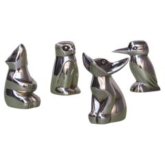 Juego de 4 saleros y pimenteros figurados Christofle "Gallia" bañados en plata