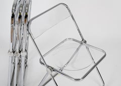 Ensemble de 4 chaises pliantes Plia en chrome et lucite transparente par Anonima Castelli, Italie