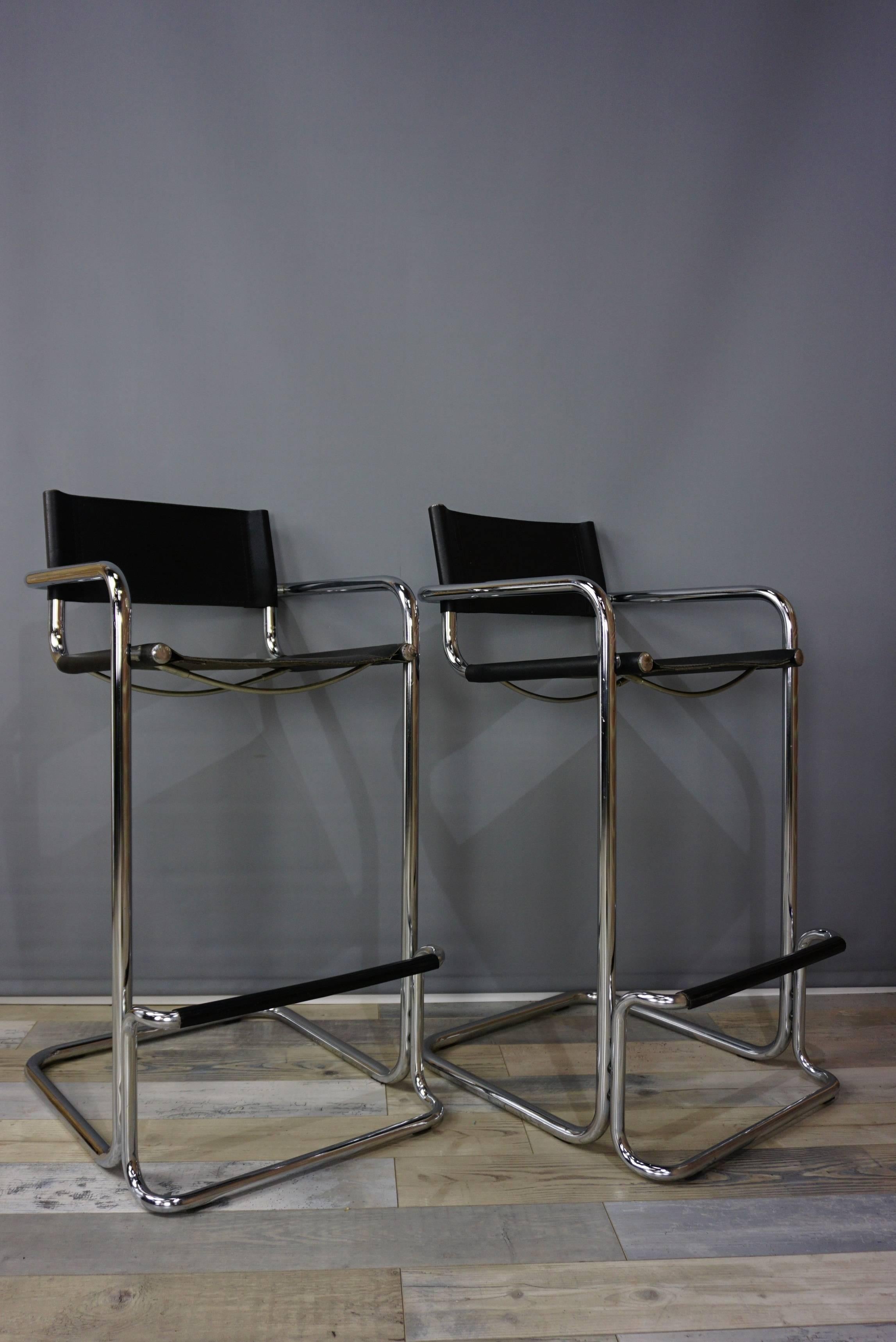 Set of four chrome and leather bar stools Mart Stam Bauhaus design: cantilevered chrome frame with black leather.