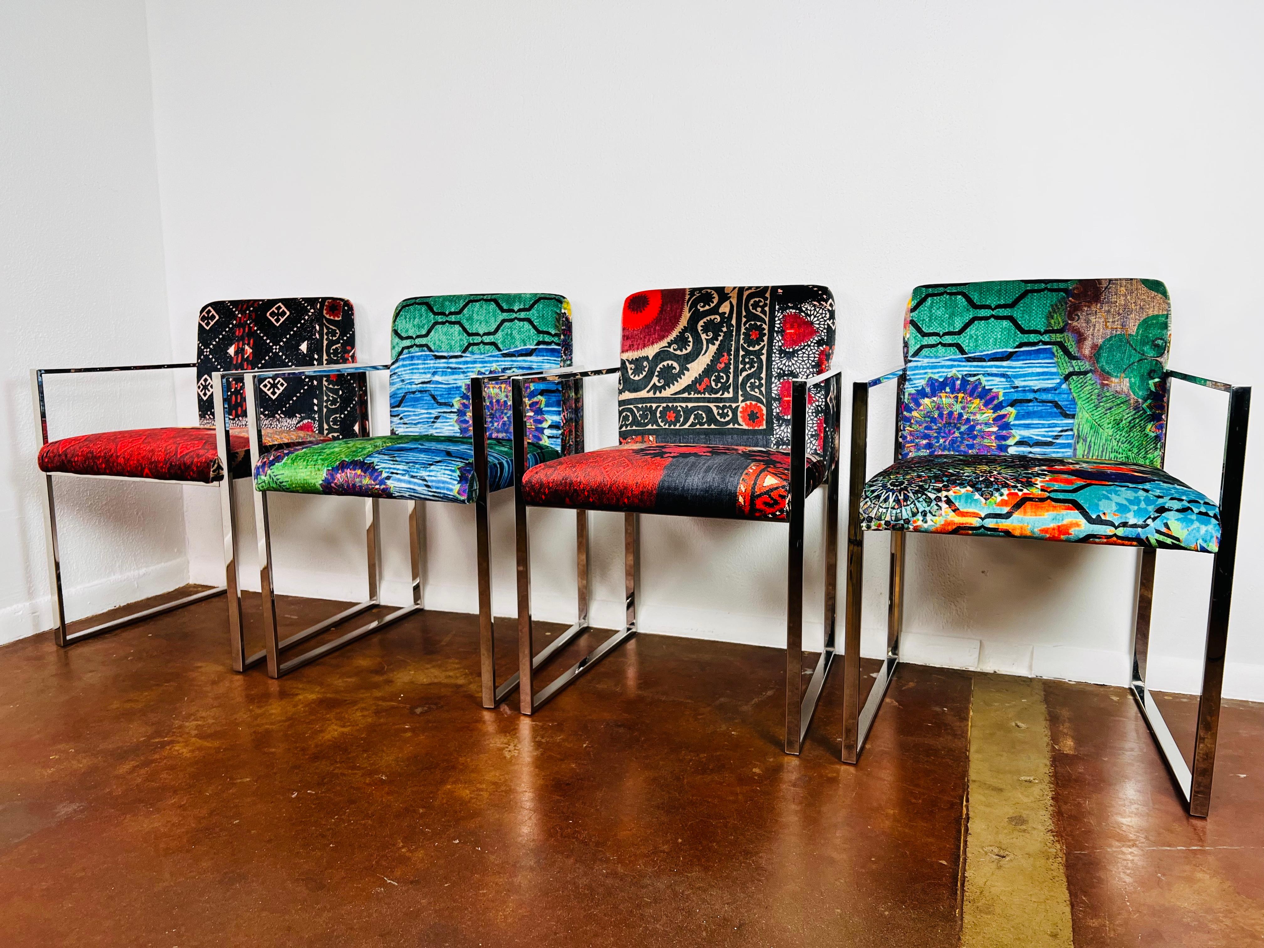 Set of 4 square chrome frame dining chairs in the style of Milo Baughman. Gorgeous bold mismatched upholstery. From Casa Palacio in Mexico City.