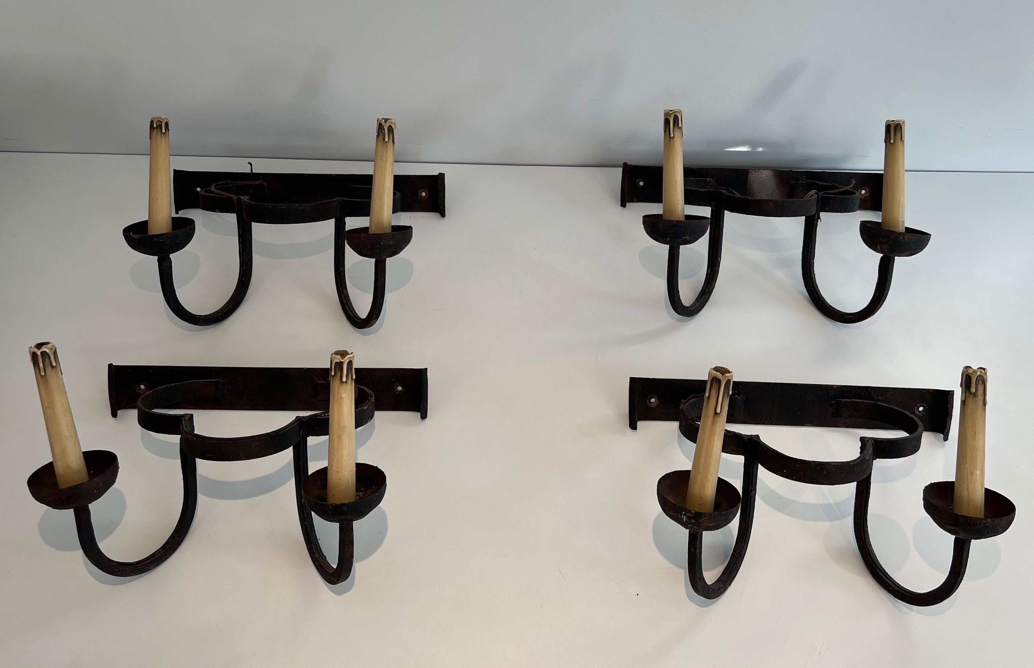 Mid-Century Modern Set of 4 clover wrought iron wall lights. French work. Circa 1950 For Sale