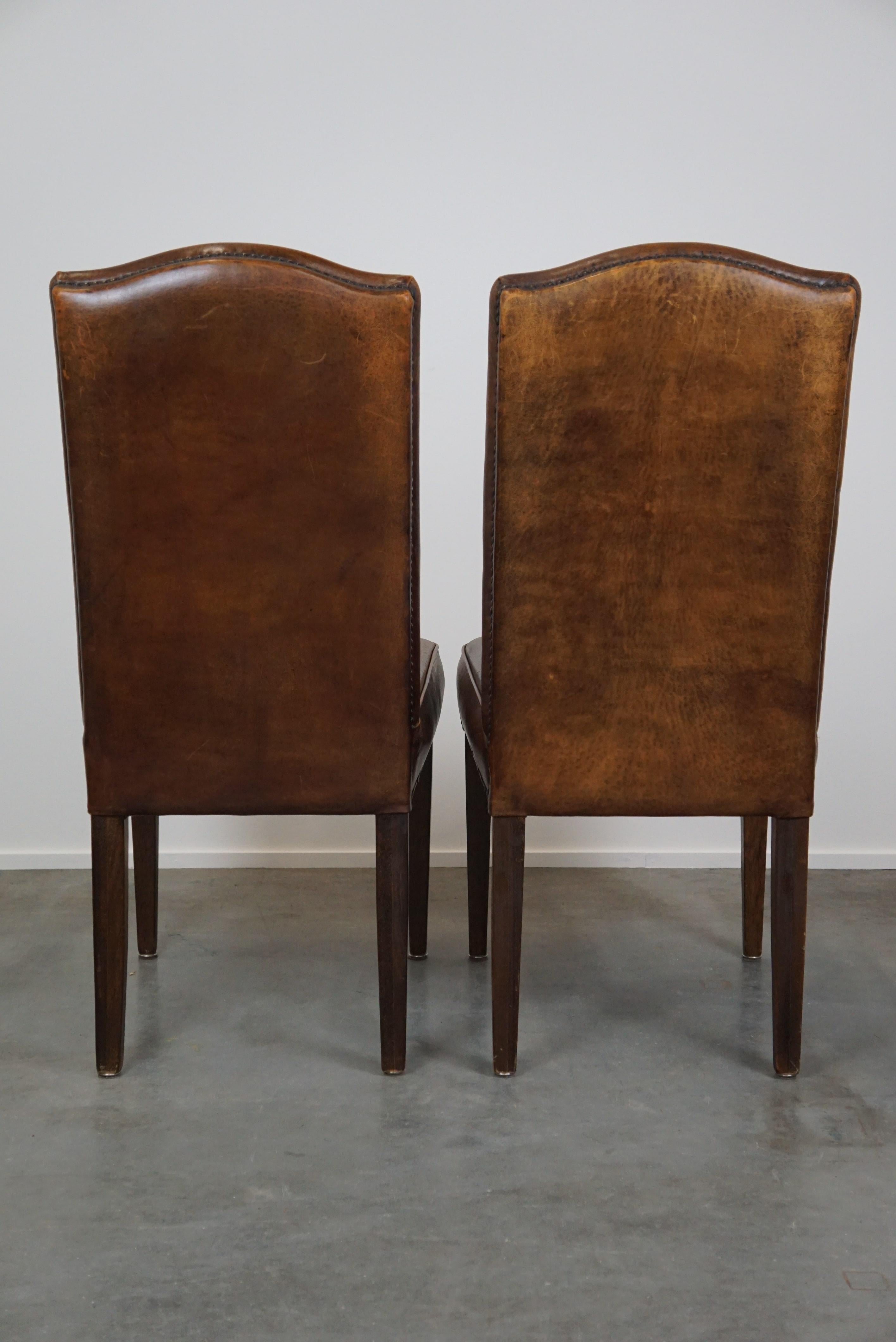 Late 20th Century Set of 4 cognac-colored sheep leather dining chairs with a beautiful patina For Sale