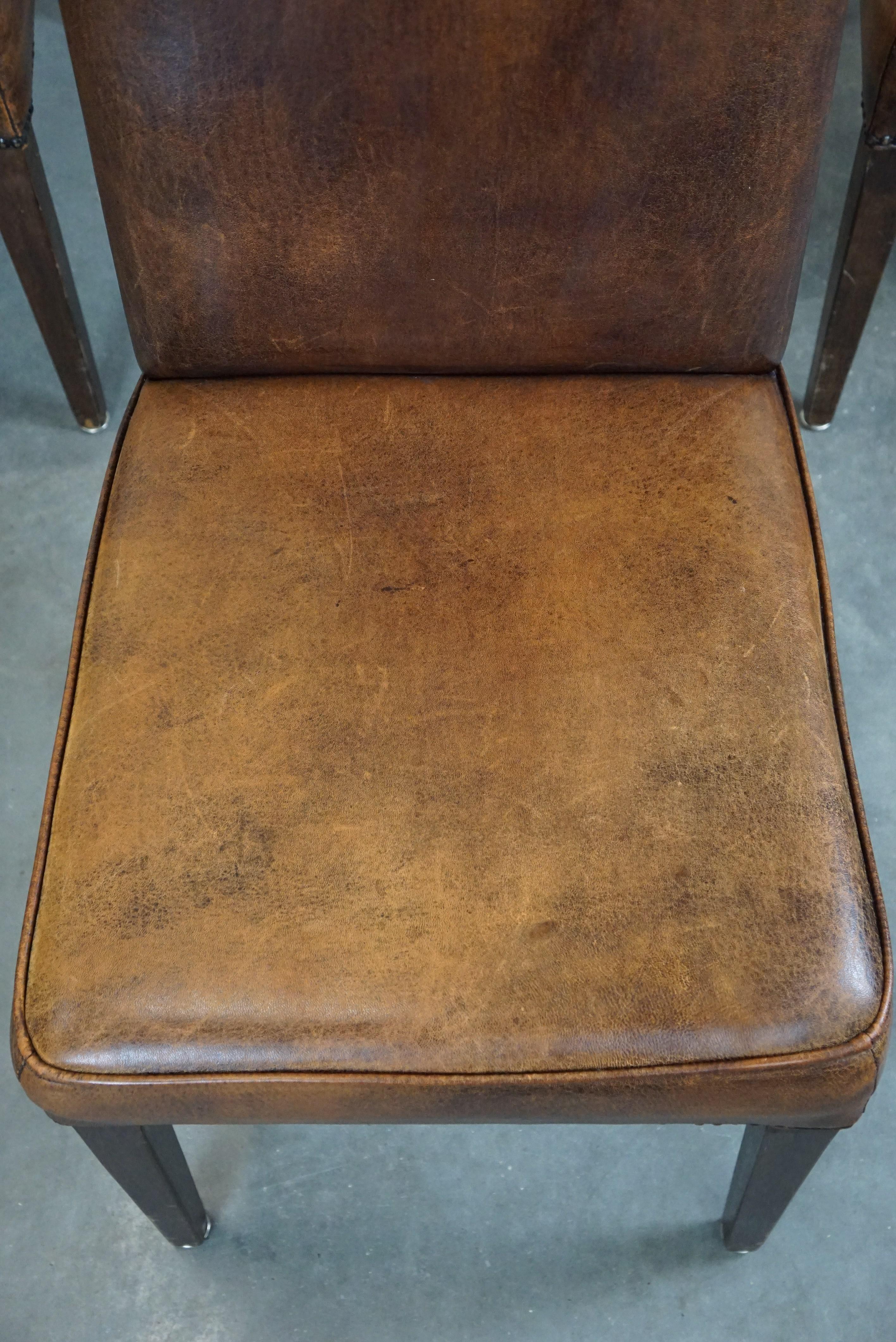 Set of 4 cognac-colored sheep leather dining chairs with a beautiful patina For Sale 2
