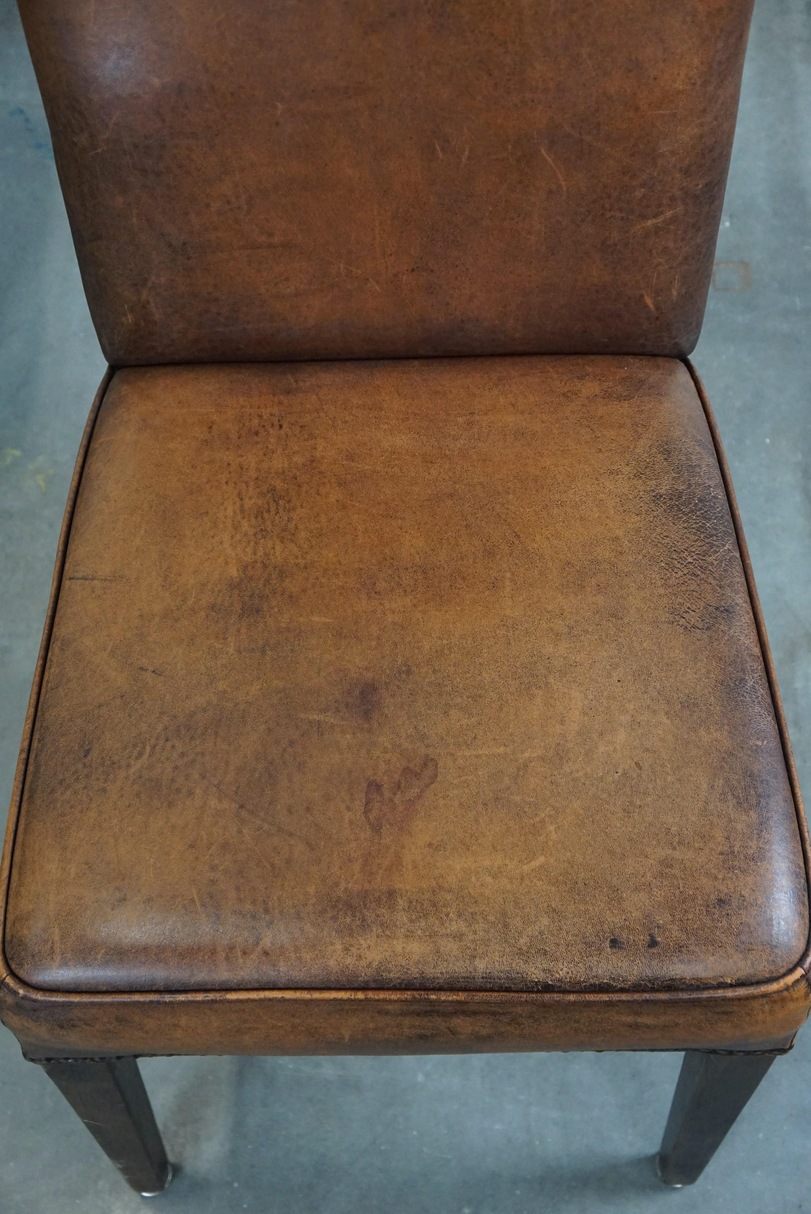 Set of 4 cognac-colored sheep leather dining chairs with a beautiful patina For Sale 3