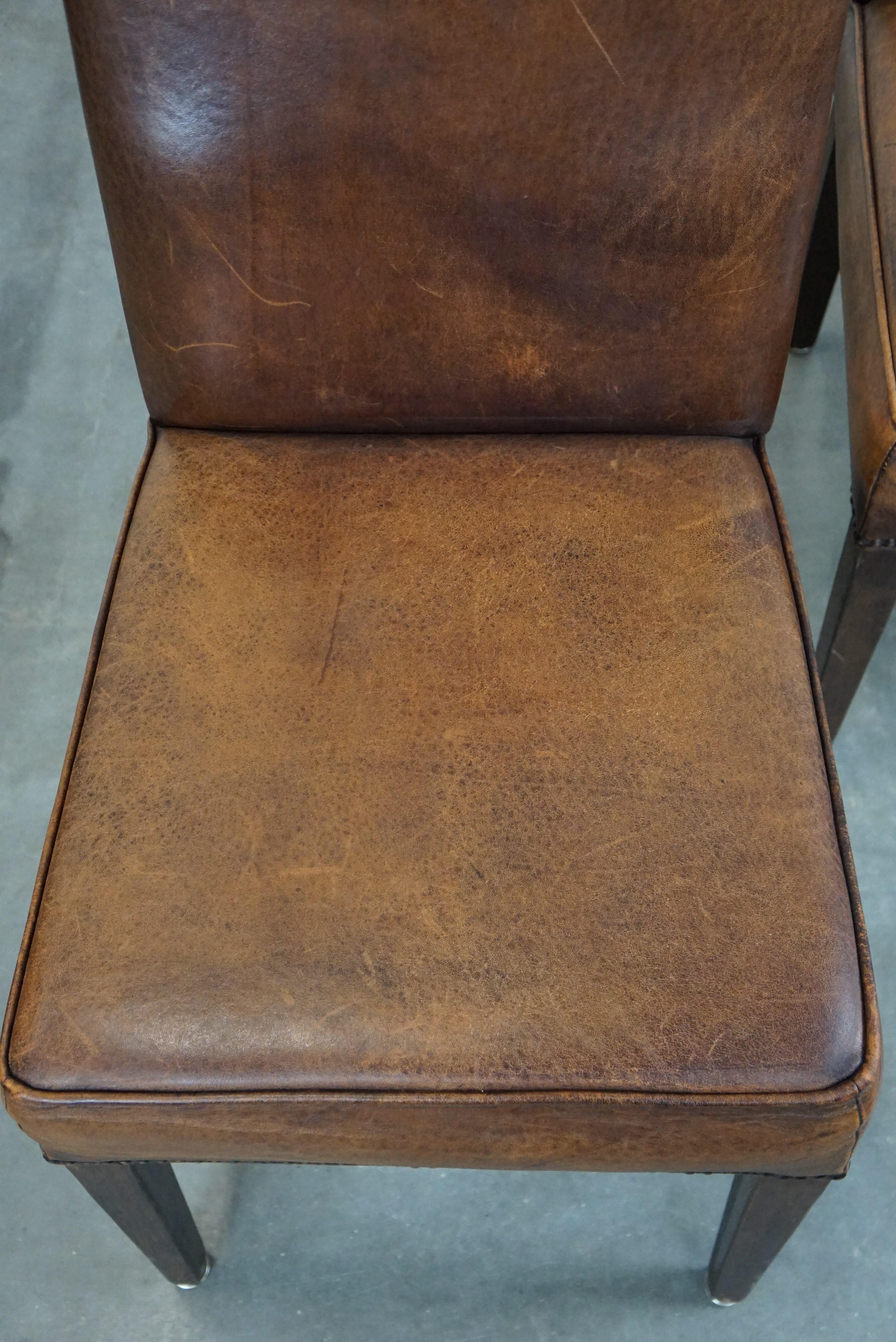 Set of 4 cognac-colored sheep leather dining chairs with a beautiful patina For Sale 4