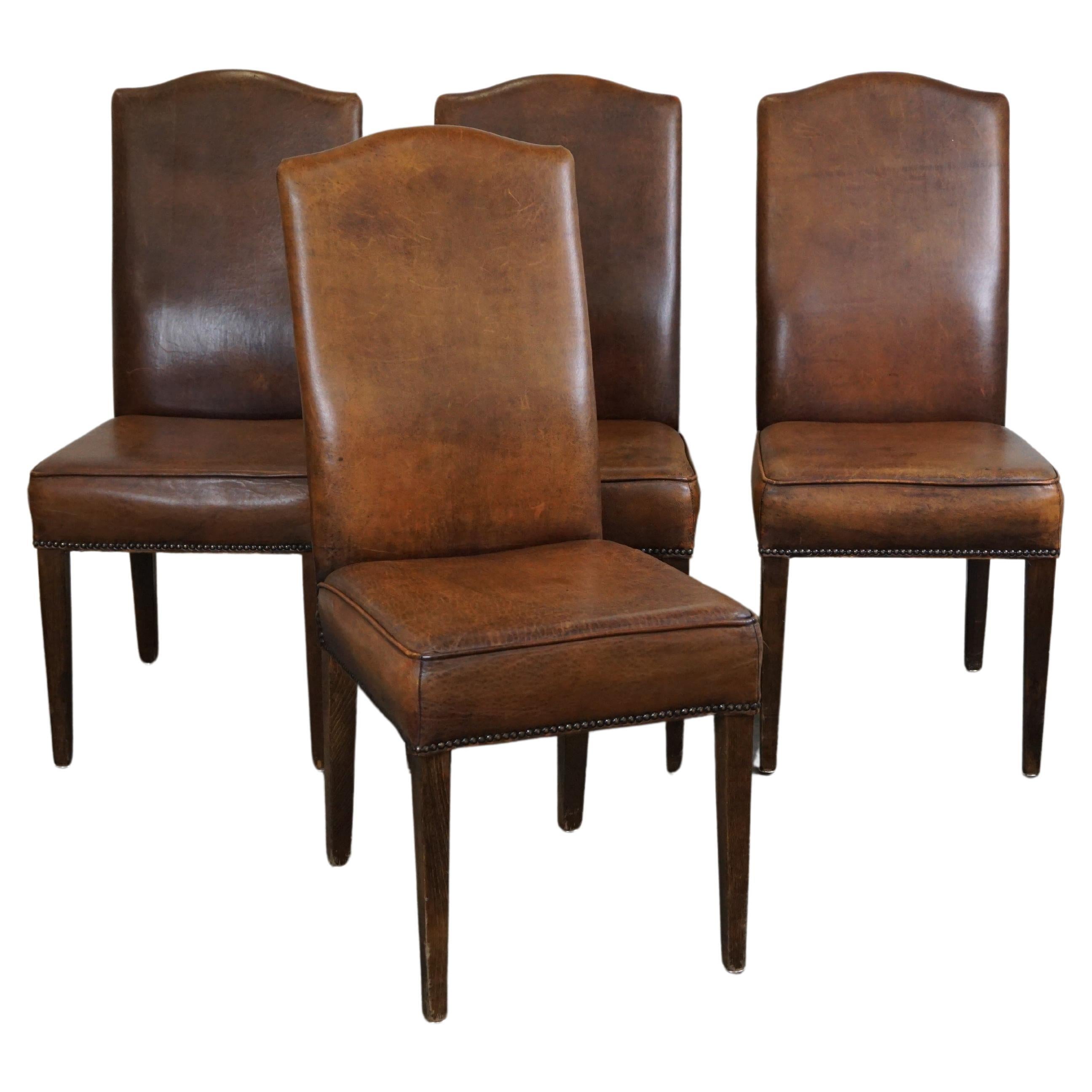 Set of 4 cognac-colored sheep leather dining chairs with a beautiful patina For Sale