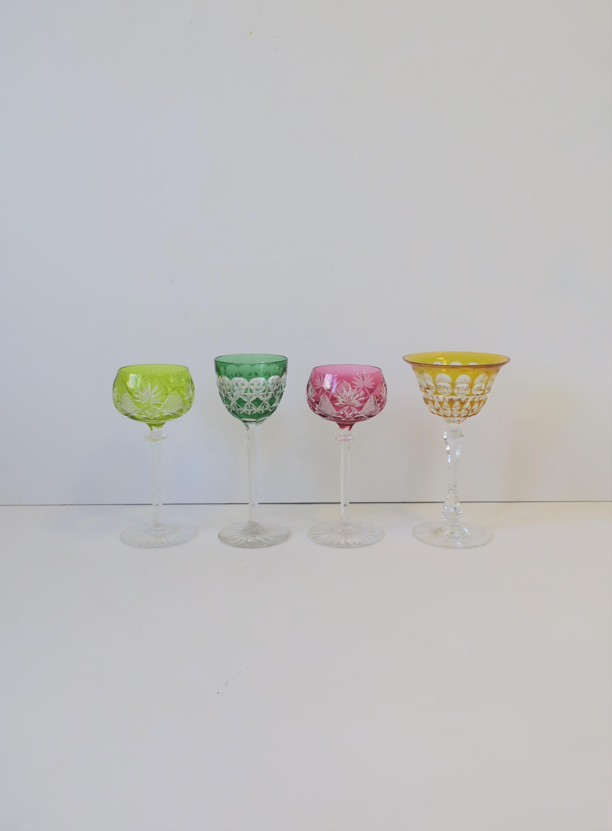 A very beautiful set of 4 brightly colored 'cut -to-clear' mid-20th century Bohemian crystal cocktail glassware stemware in the style of luxury makers, Val St Lambert, Baccarat, or Saint-Louise, circa 1960s, Europe, Czechoslovakia. Each glass is