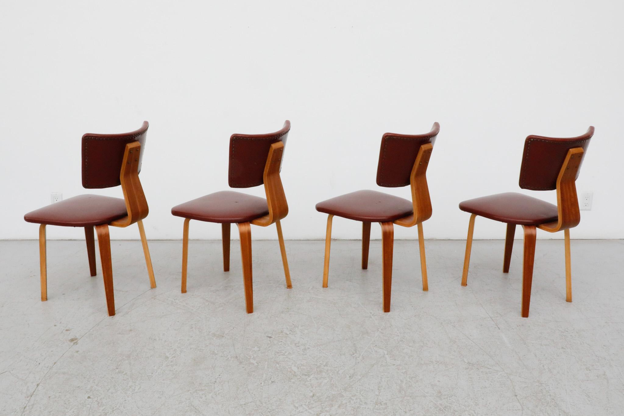 Dutch Set of 4 Cor Alons Teak and Burgundy Skai Dining Chairs For Sale