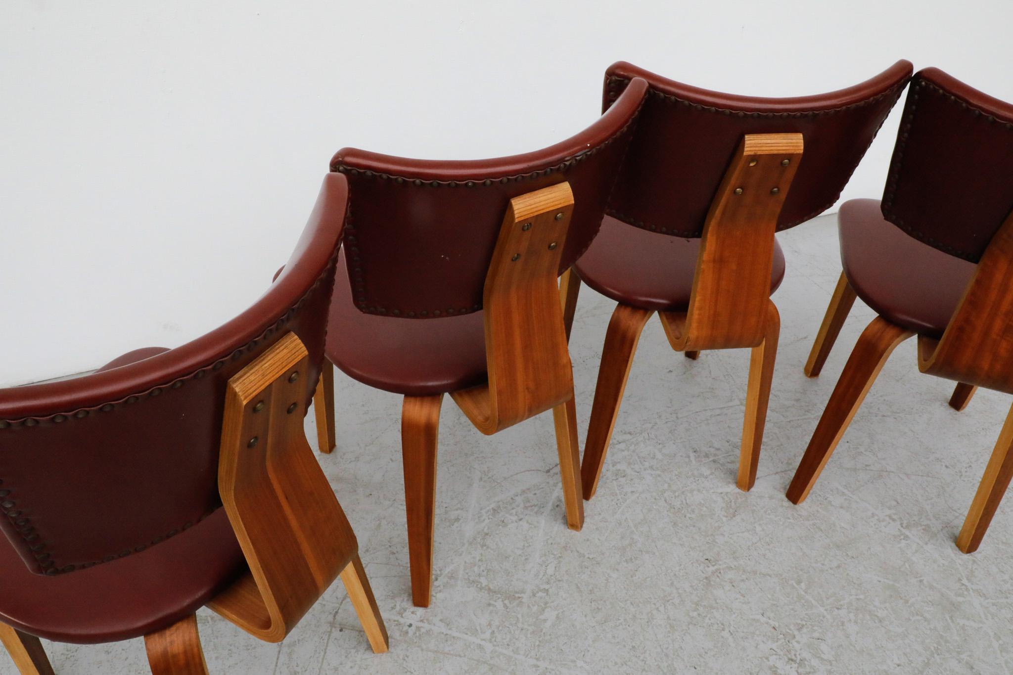 Mid-20th Century Set of 4 Cor Alons Teak and Burgundy Skai Dining Chairs For Sale
