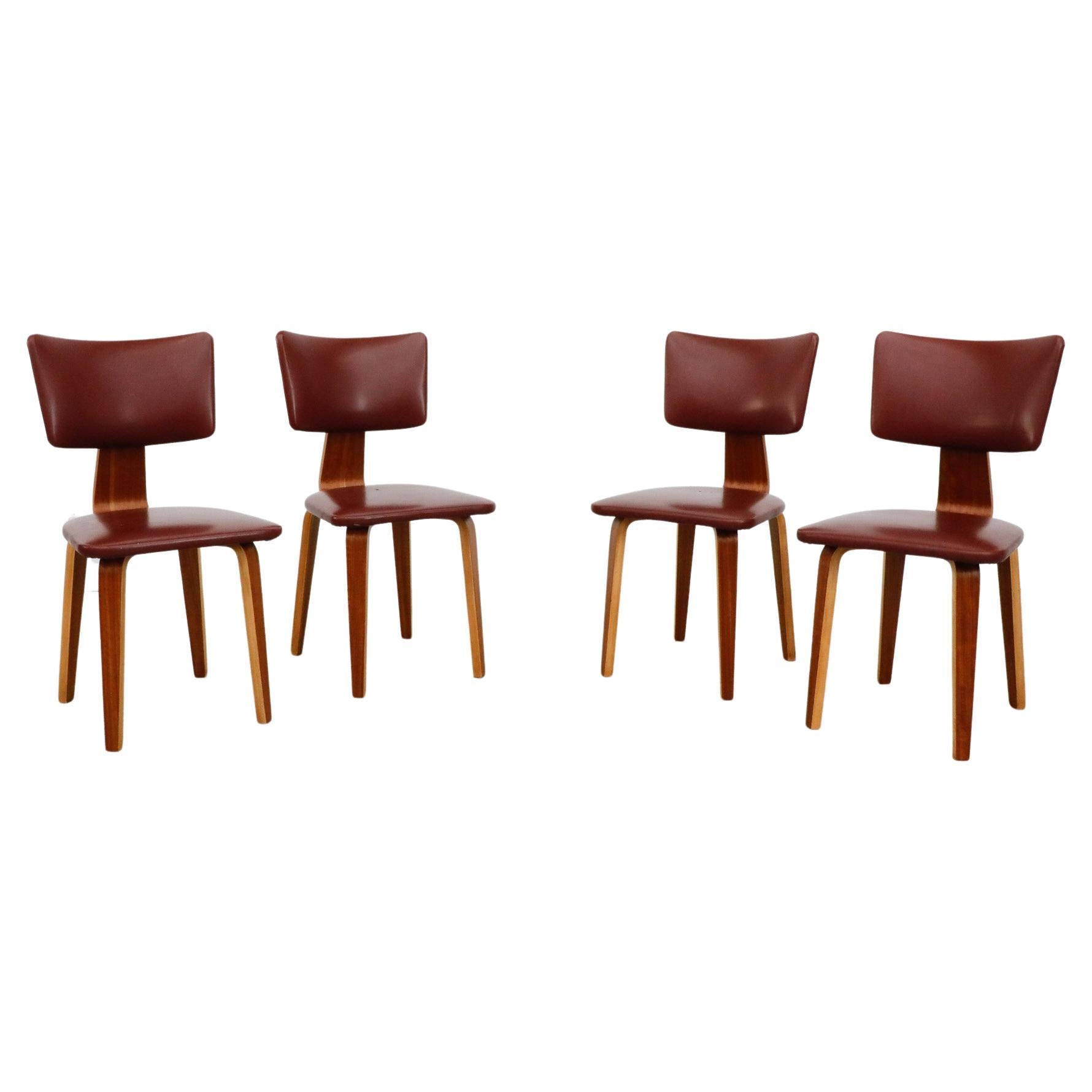 Set of 4 Cor Alons Teak and Burgundy Skai Dining Chairs For Sale