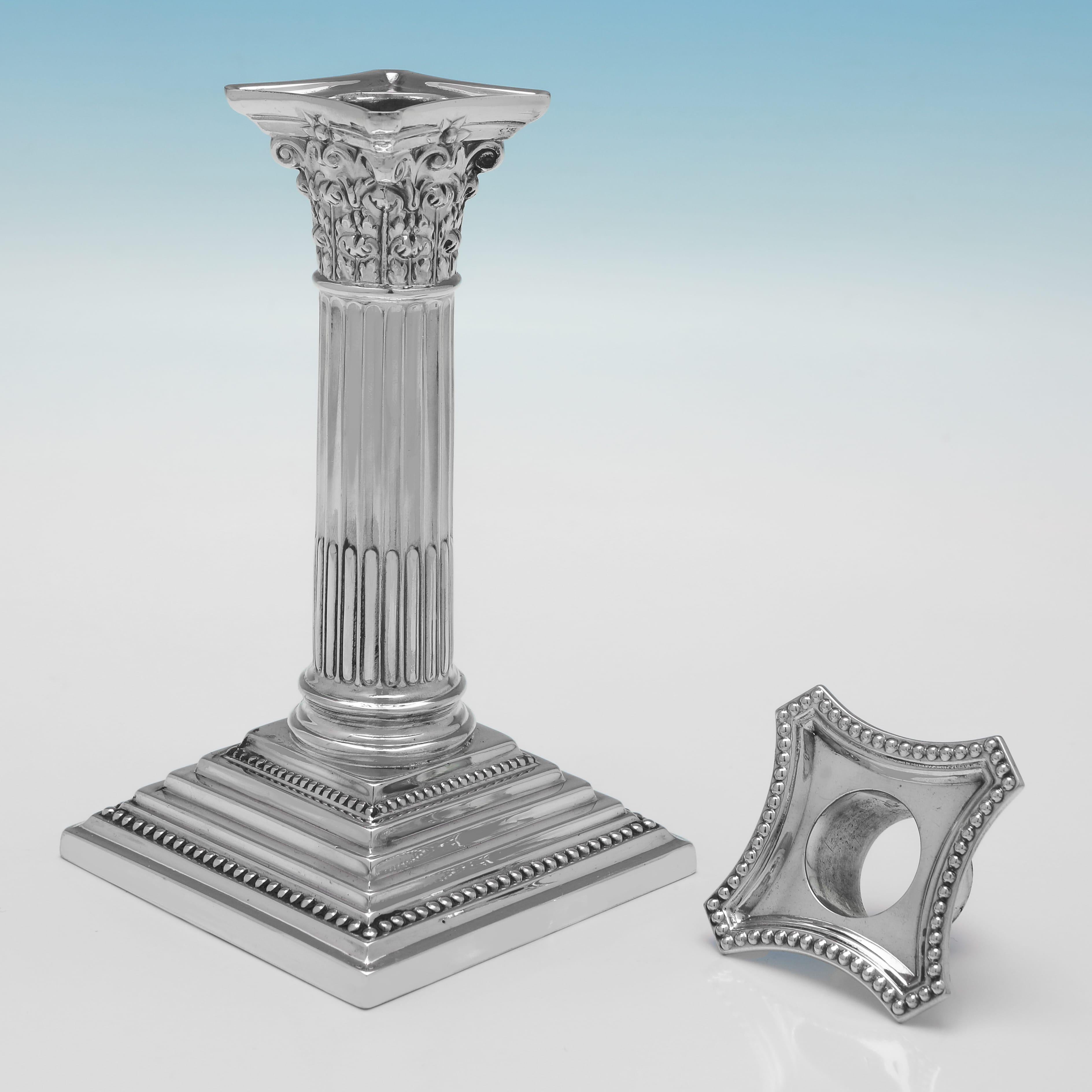 Mid-Century Modern Set of 4 Corinthian Column Sterling Silver Candlesticks made by Garrard & Co.