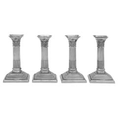 Set of 4 Corinthian Column Sterling Silver Candlesticks made by Garrard & Co.