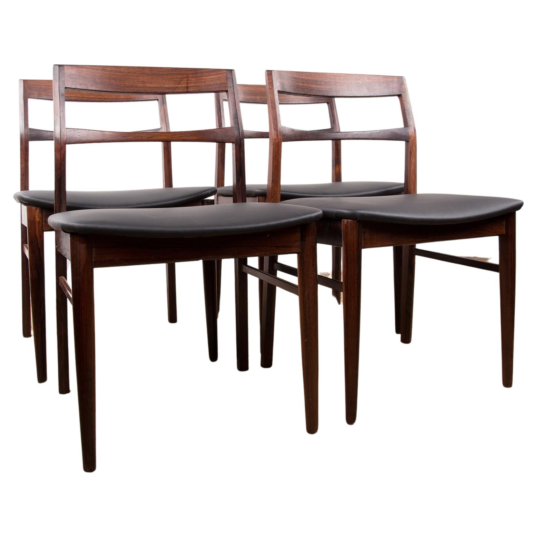 Set of 4 Danish chairs in Rosewood and Skai new by Henning Kjaernulf for Vejl For Sale