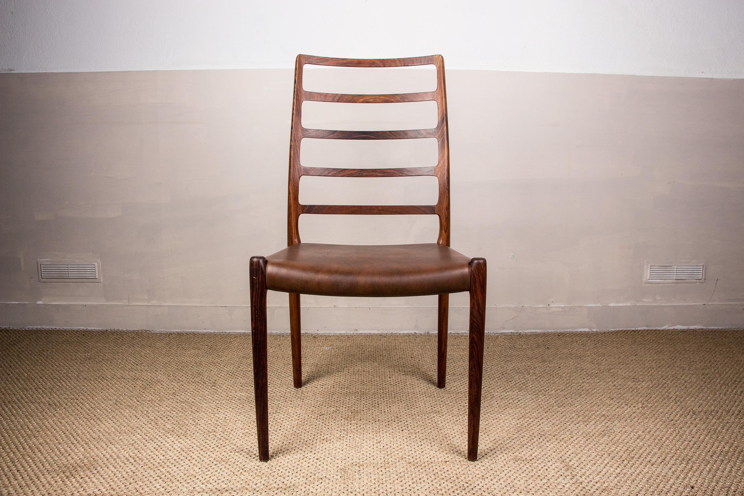 Scandinavian Modern Set of 4 Danish Dining Chairs in Rosewood Model 82 by Niels Otto Moller