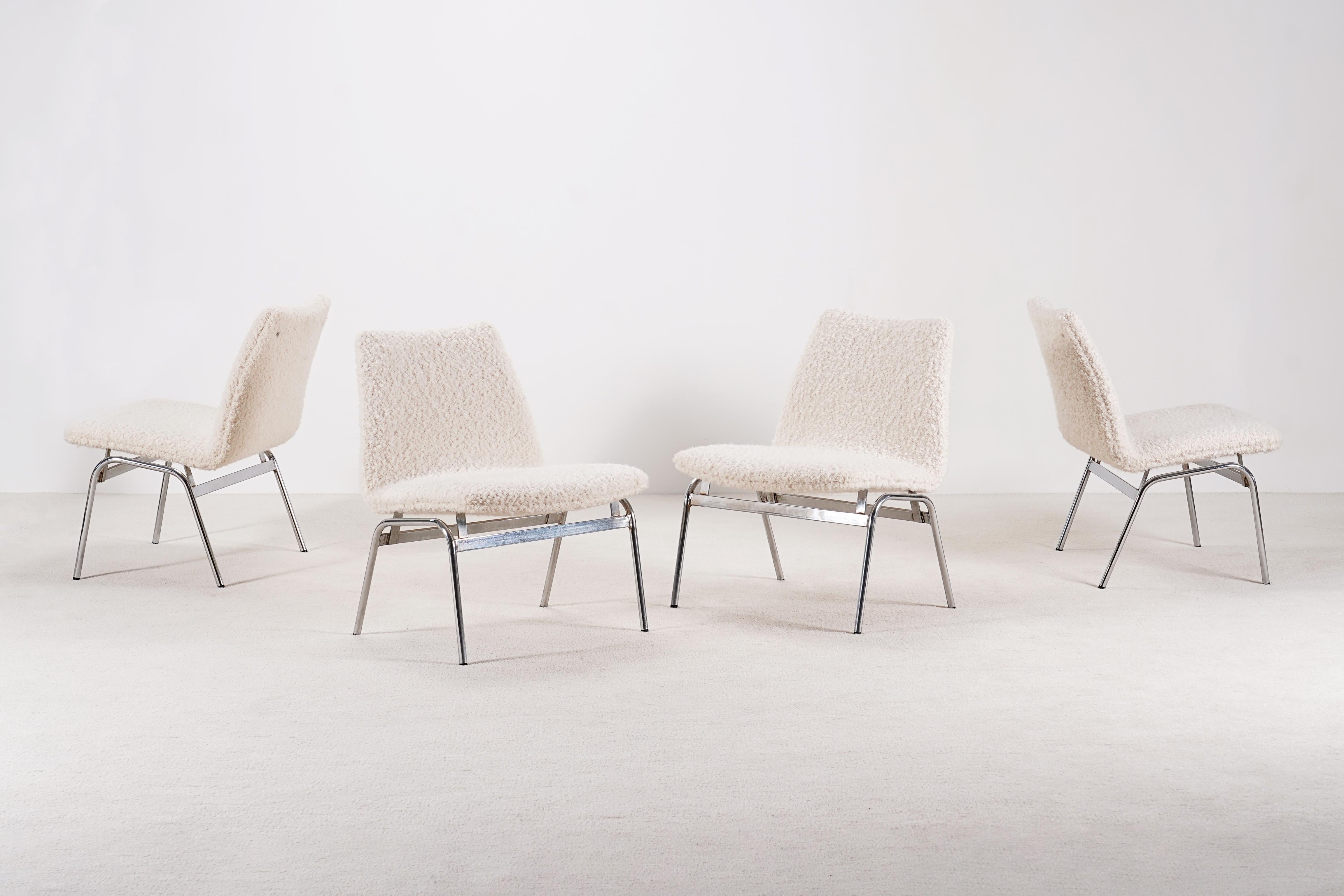 Set of 4 Danish lounge chairs produced by Duba in the 1970s.

These easy chairs were manufactured for Copenhagen airport. 

We used a high-quality bouclé wool fabric from the French house Nobilis. 

Chromed tubular steel structure.

Very good