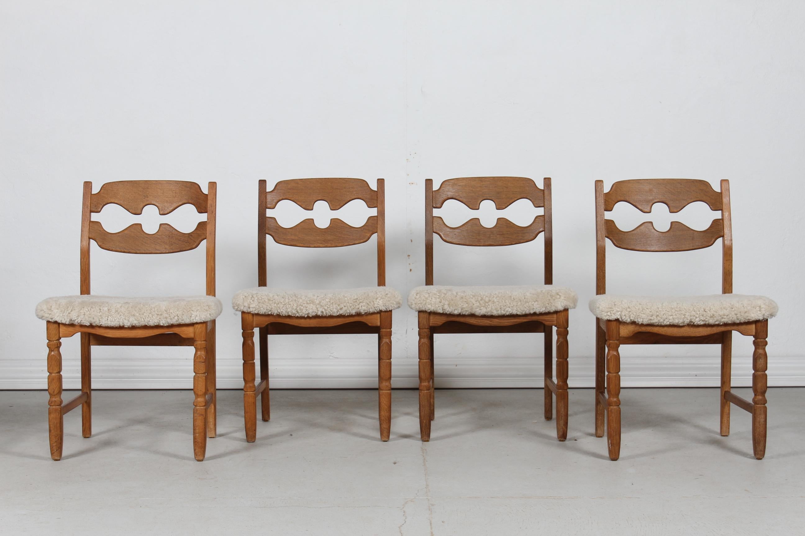Here is a set of 4 Danish vintage razor blade chairs in great country style. 
They are designed by Henning Kjærnulf and manufactured by the Danish company Nyrup Møbelfabrik/ EG Furniture.
The chairs are made of solid oak with upholstery of new