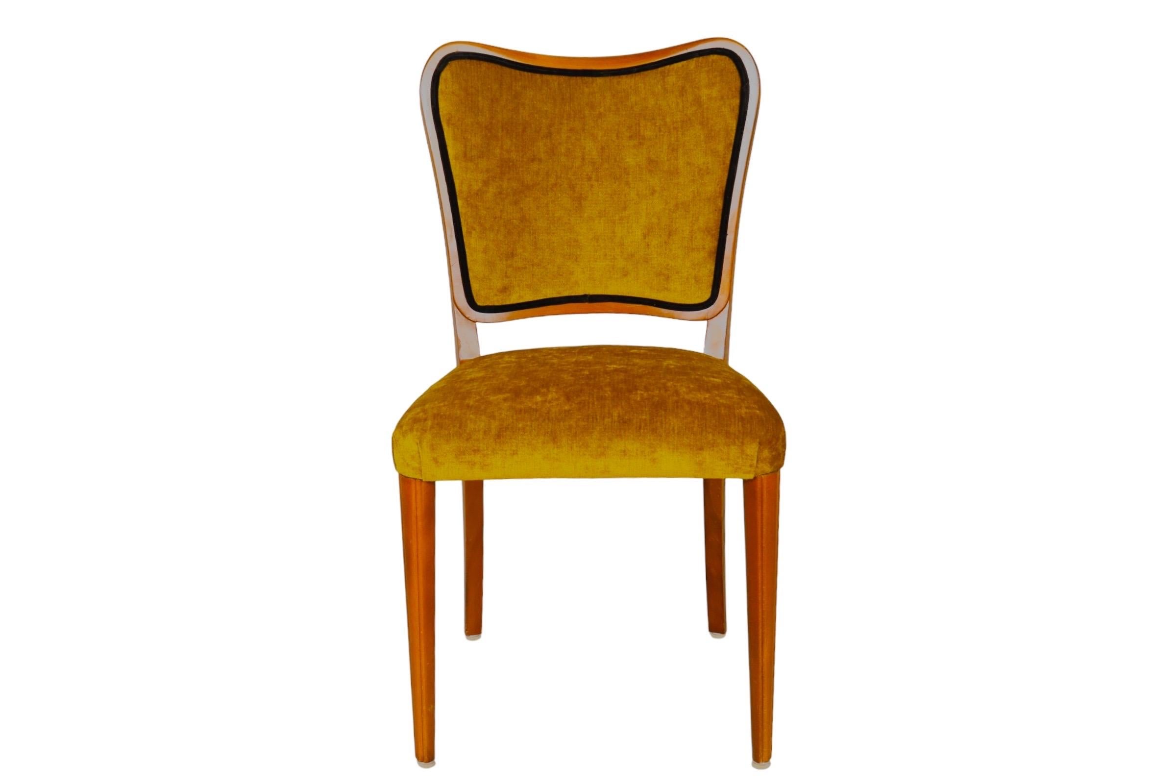 Set of 4 Danish Mid-Century Modern dining chairs made of teak. Newly upholstered throughout in chartreuse velvet.