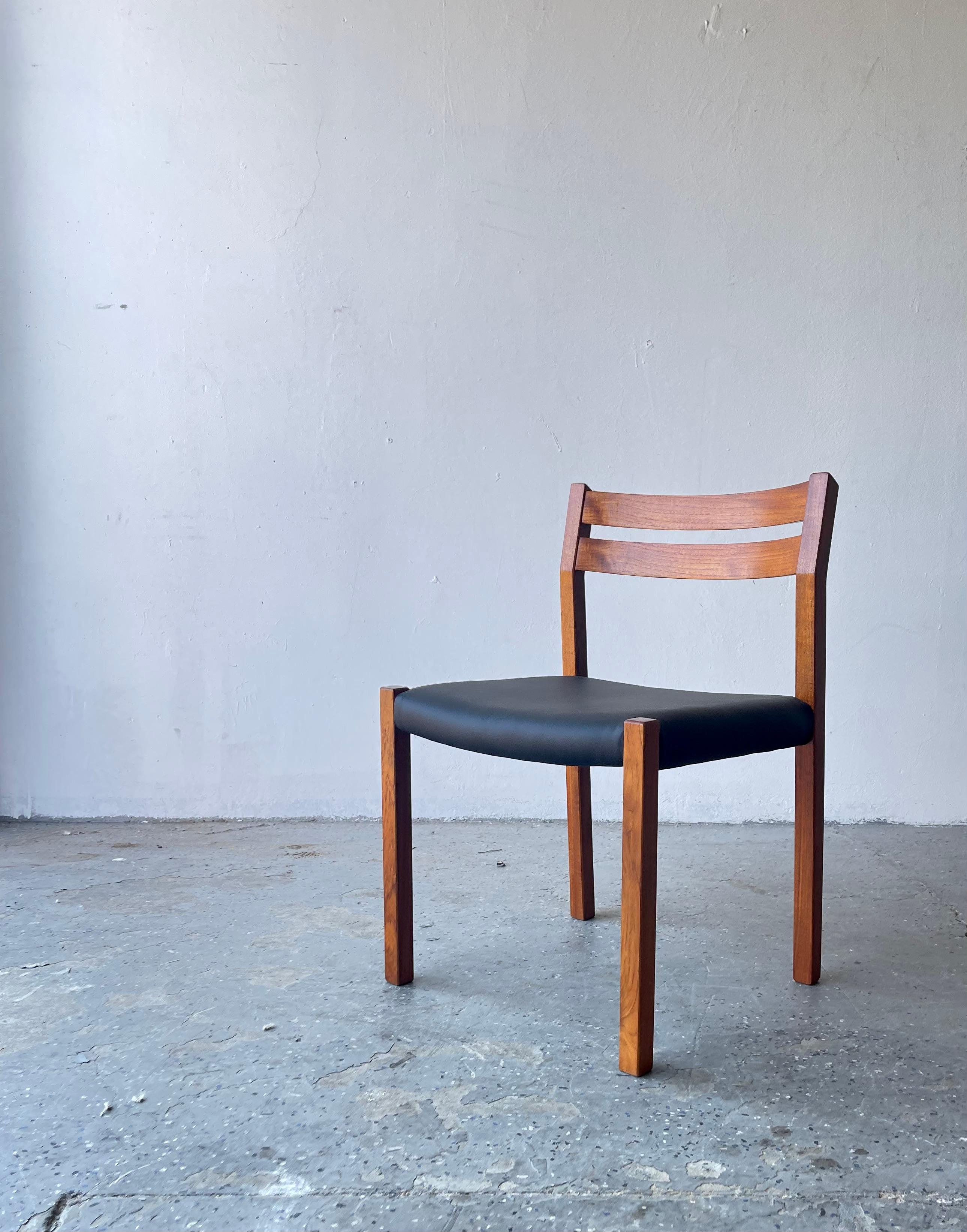 This set of 4 J.L Moller Model 401 dining chairs was designed in 1974 by Jorgen Henrik Moller for J.L Moller Moblefabrik of Denmark. Generously proportioned seats and solid teak frames. A gorgeous set of elegant design. Meticulously restored to like
