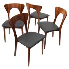 Ensemble de 4 chaises danoises en palissandre:: de style moderne du milieu du siècle:: par Niels Koefoed