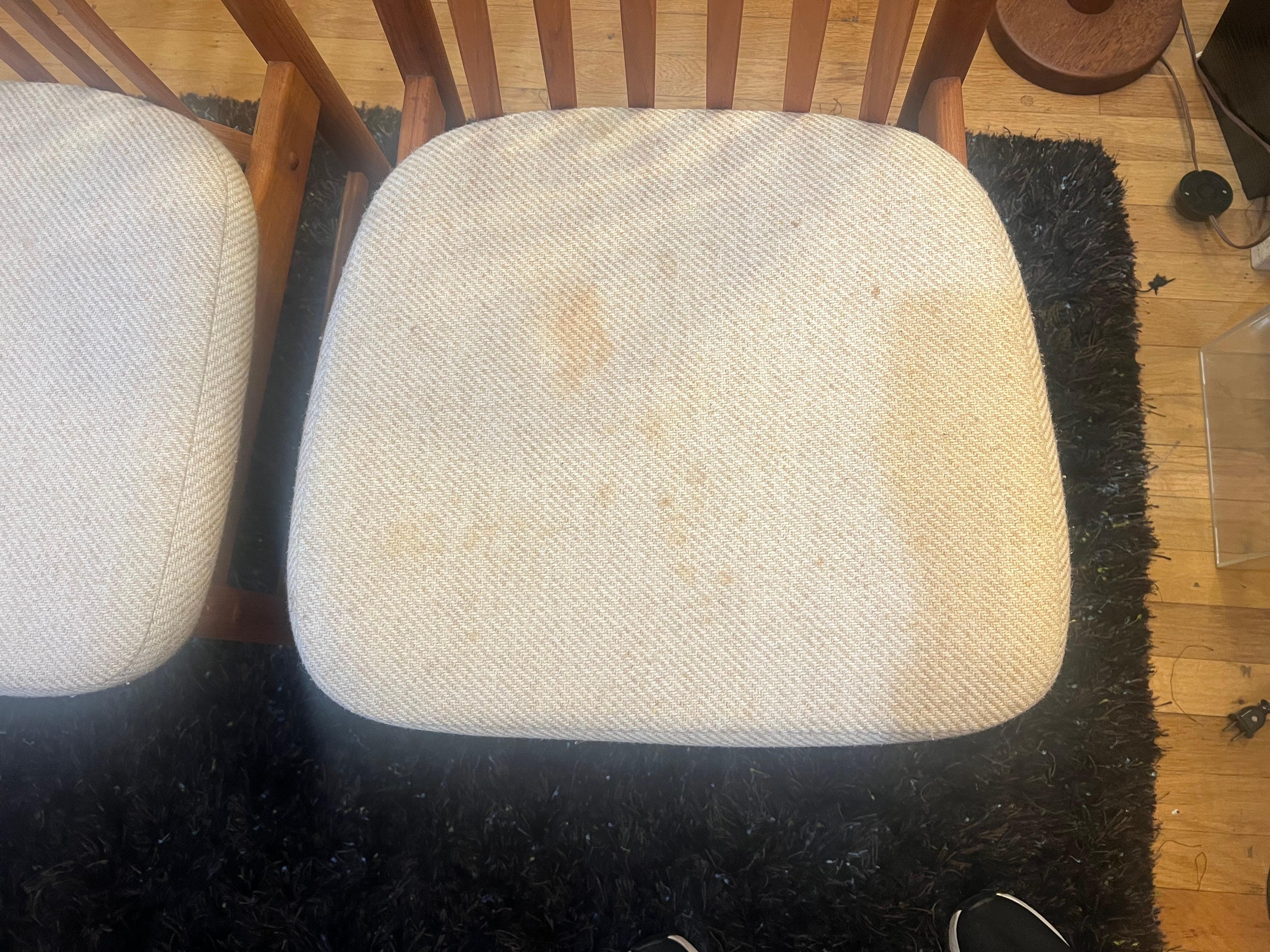 A very good looking set of 4 Danish modern solid teak dining chairs, circa 1980's solid and sturdy original fabric very easy to replace shows some stains it can also be cleaned but we are selling it as/is condition, the chairs shows a beautiful