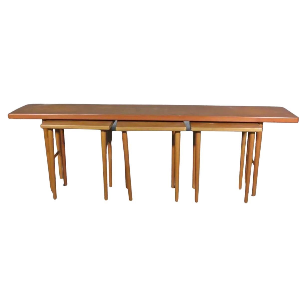 With a compact design, rich teak wood surface, and Mid-Century style, this set of nesting tables is a unique addition to any room. Please confirm item location with seller (NY/NJ).
Large table: 59