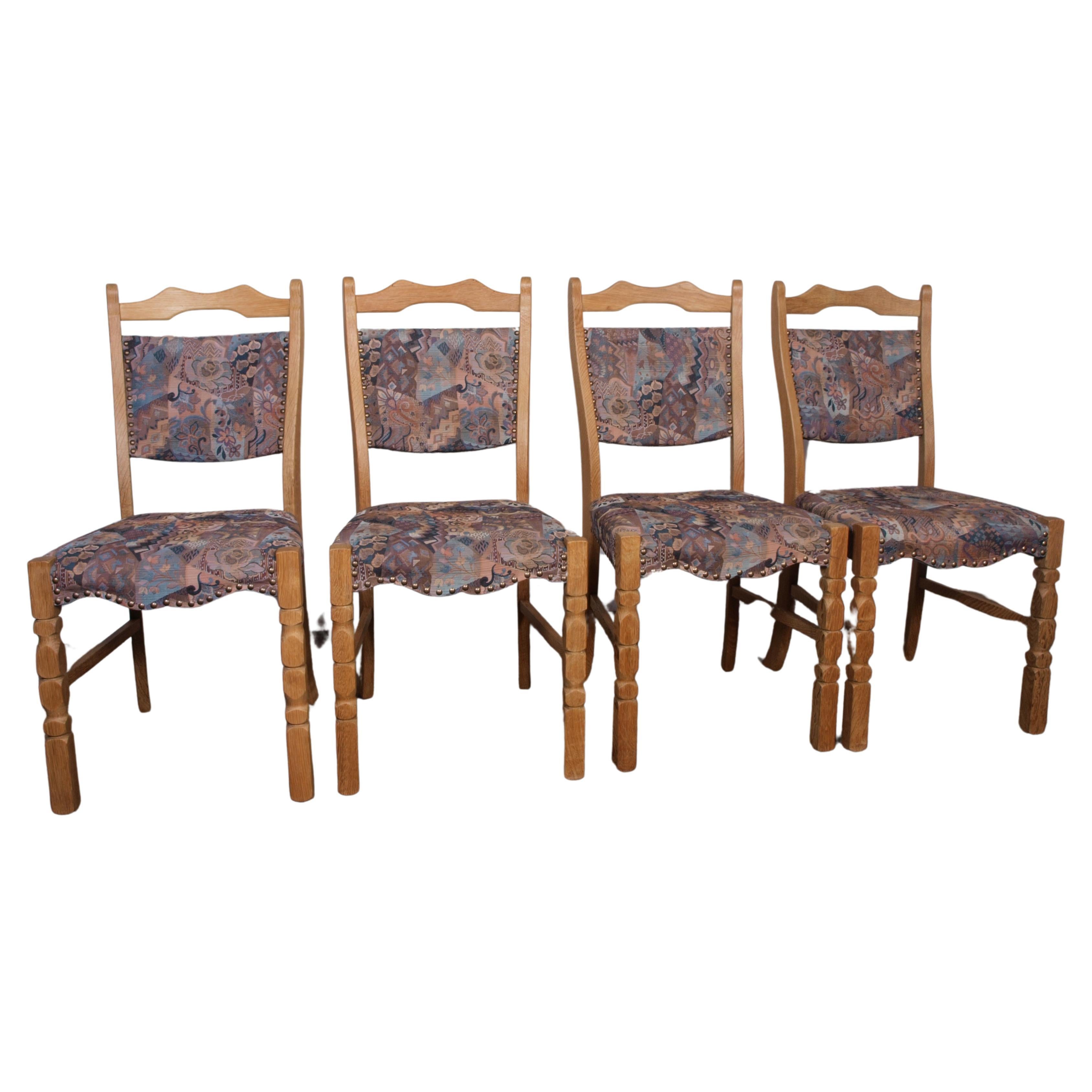 set of 4 Danish Oak Dining Chairs attributed to Henning Kjærnulf For Sale