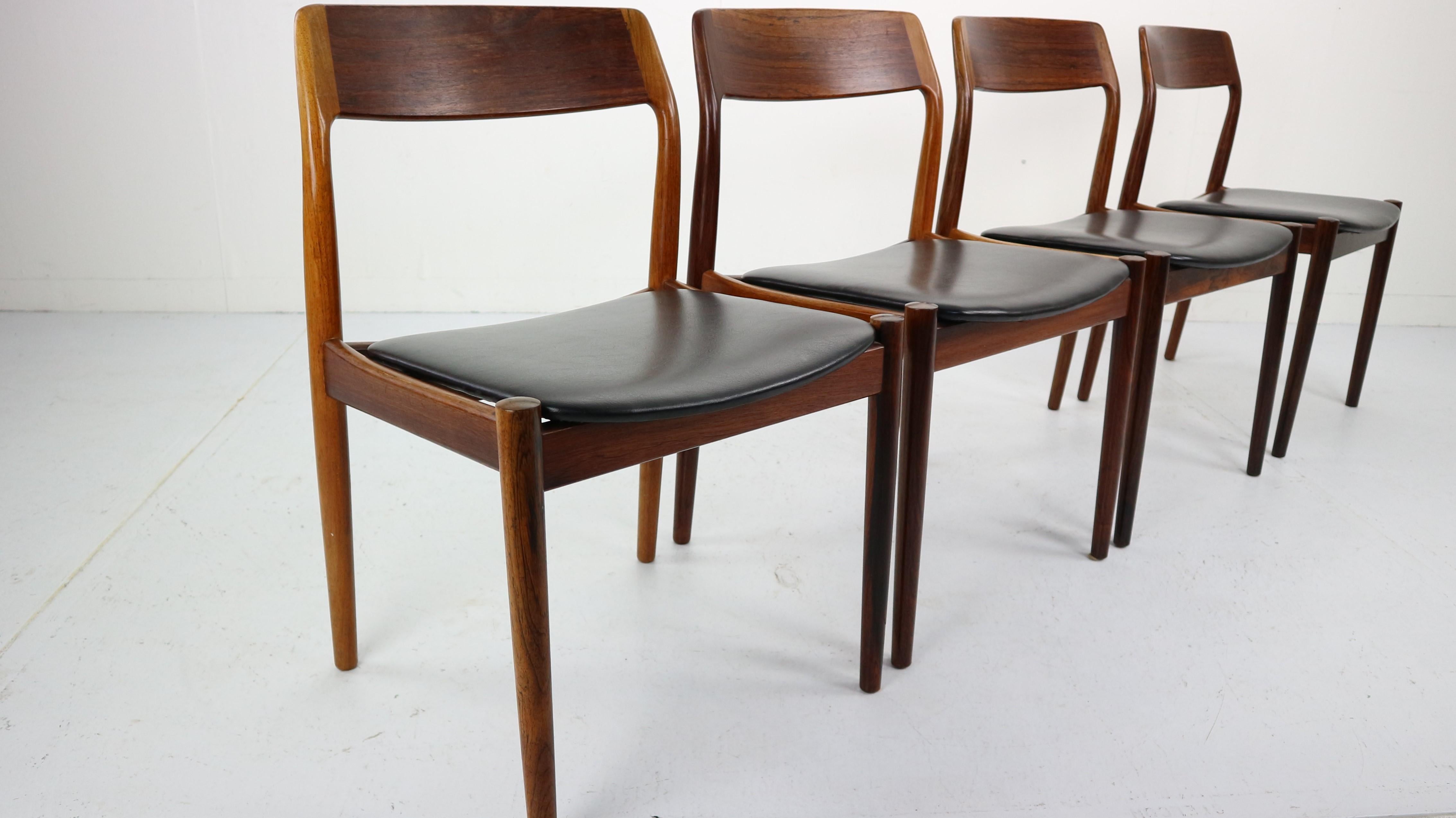 Set of 4 dining room chairs designed by Niels Otto Møller in 1960s, Denmark.
Chairs are made from rosewood frame and black vinyl seating. 
All chairs are originally marked.
 
