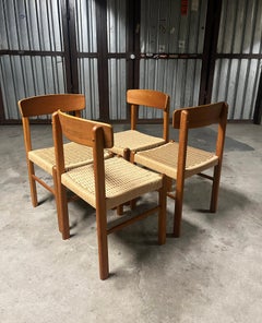 Ensemble de 4 chaises à manger danoises en teck et sièges en cordon de papier 1960s