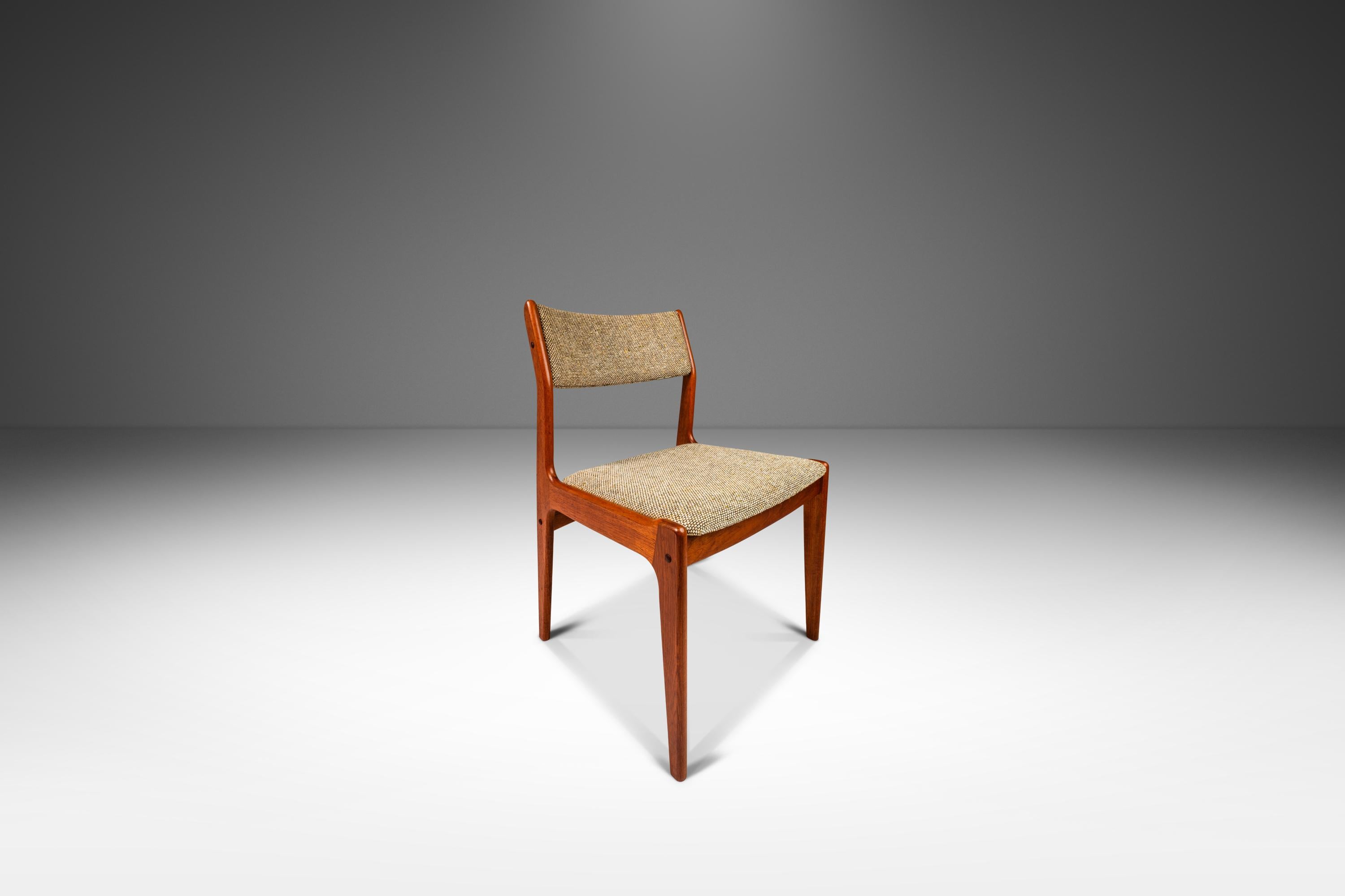 Introducing a set of vintage D-SCAN dining chairs that have been left in 100% original condition. Featuring solid Burmese teak frames and intricate finger joinery all showcasing exceptional old-growth and variegated woodgrains unique to teak this