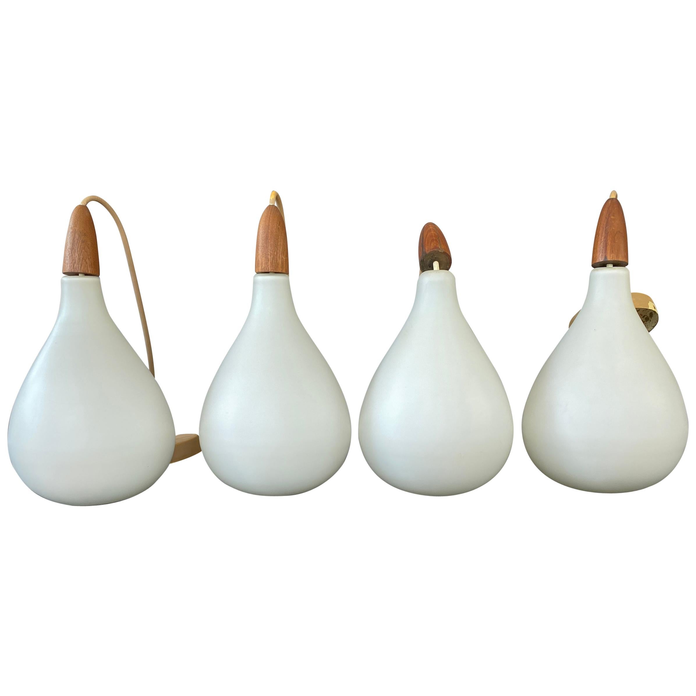 Set of 4 Danish White Cased Glass and Teak Pendants