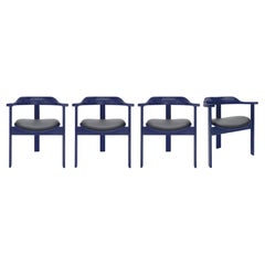 Ensemble de 4 fauteuils Haussmann bleu foncé par Robert & Trix Haussmann, Design, 1964