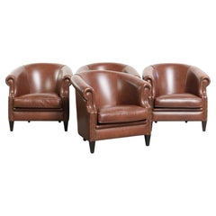 Ensemble de 4 fauteuils club en cuir de vachette de couleur cognac foncé de style anglais