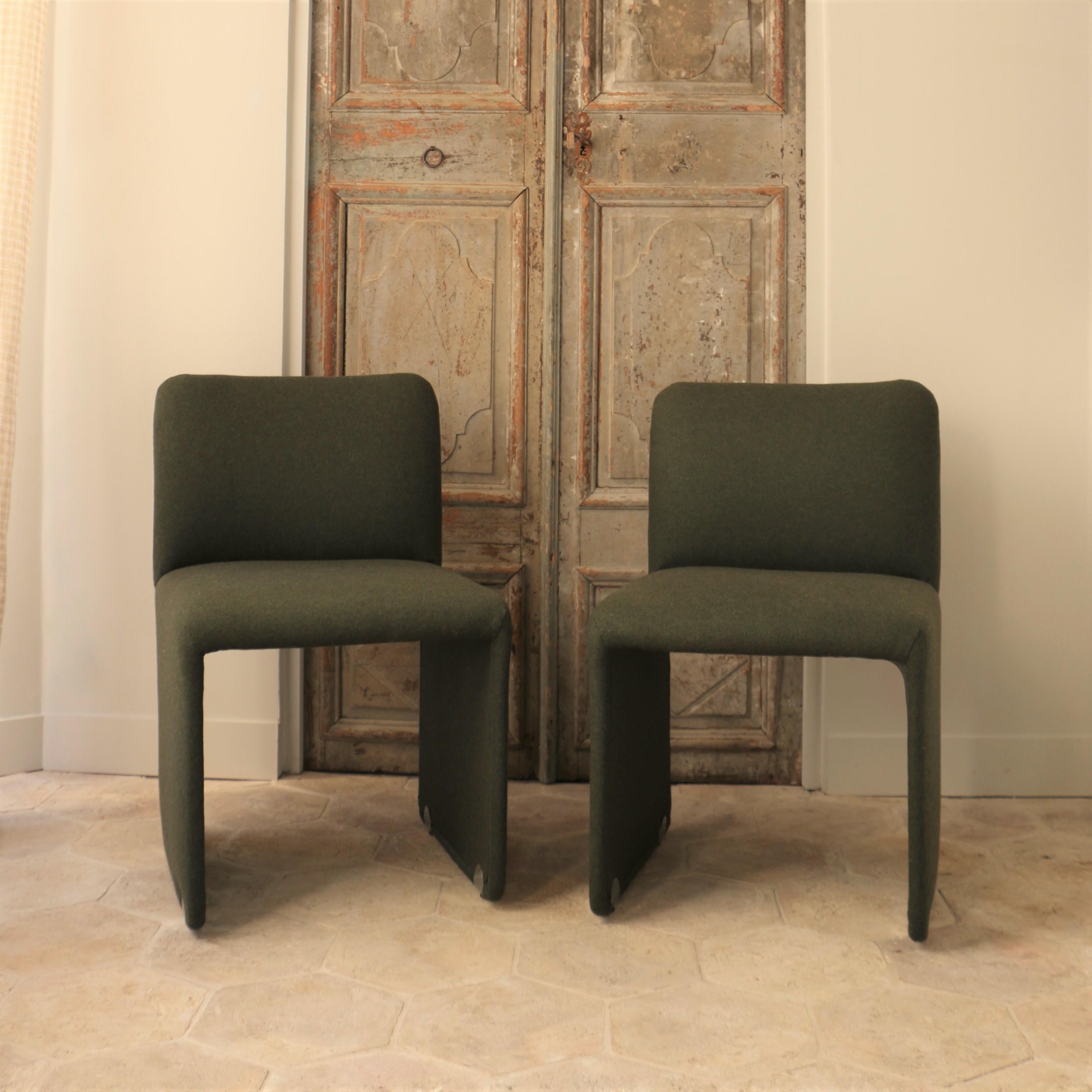 Set of four chairs, covered with a flannel fabric from Casamance, reinforced by a metal piece at the feet, in style of the French designer Pierre Paulin.