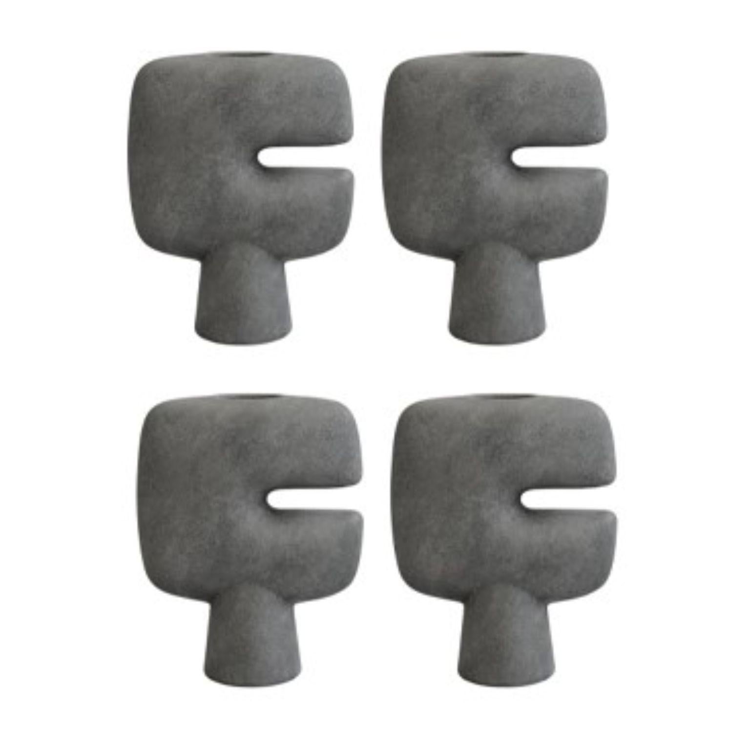Set of 4 Dark Grey tribal vases mini by 101 Copenhagen
Designed by Kristian Sofus Hansen & Tommy Hyldahl.
Dimensions: L 21 / W 9 / H 25.5 cm.
Materials: ceramic

The Tribal collection is a series of vases designed as a sculptural take on the
