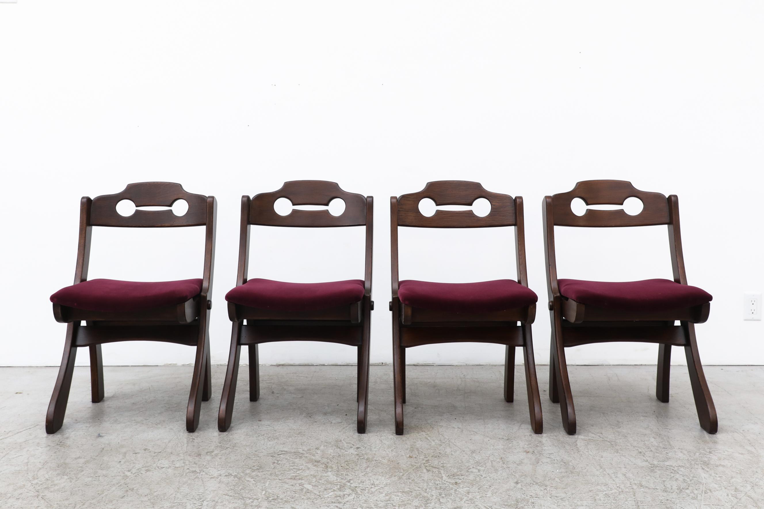 Set of 4 dark stained brutalist razor back chairs with new burgundy velvet seats. Lightly refinished with some remaining visible wear, consistent with age and use. Set price.