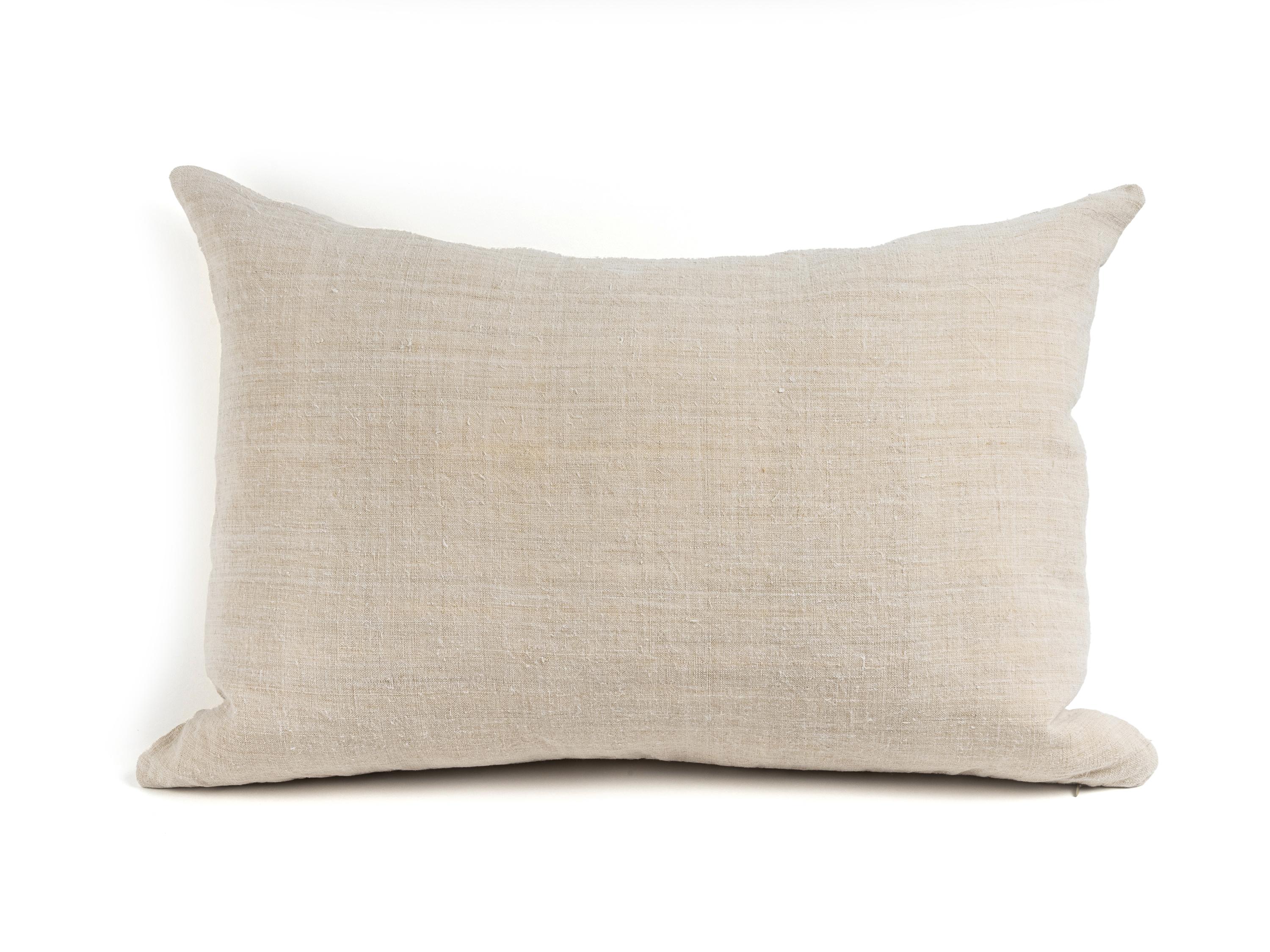 One pair of big through pillows made from pieces recovered from an antique and rustic hemp fabric sheet (First Half 20th century, France). Size: 70x50 cm. Color: Sand Beige. 
The second pair are two smaller cushions ideal for the lumbar made with