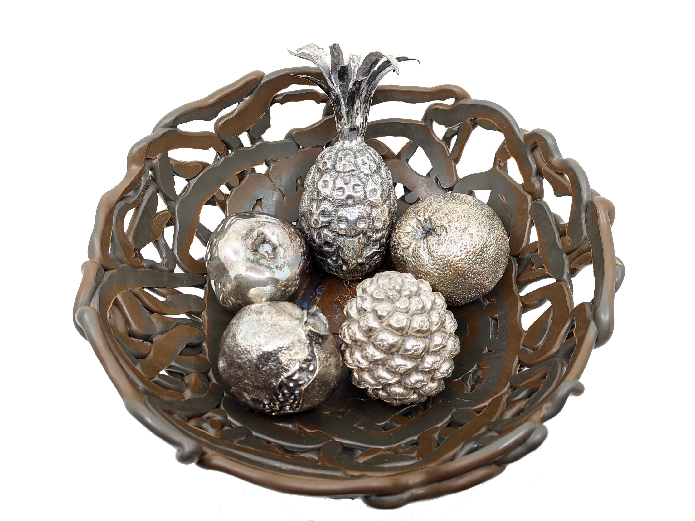 Set of four silver-plated fruits produced by silversmith Marcello Giorgio in Italy in the 1970s. These fruits (an apple, an orange, a pomegranate, and a pine cone) are of moderate size and highly decorative. Each fruit is marked and hallmarked.