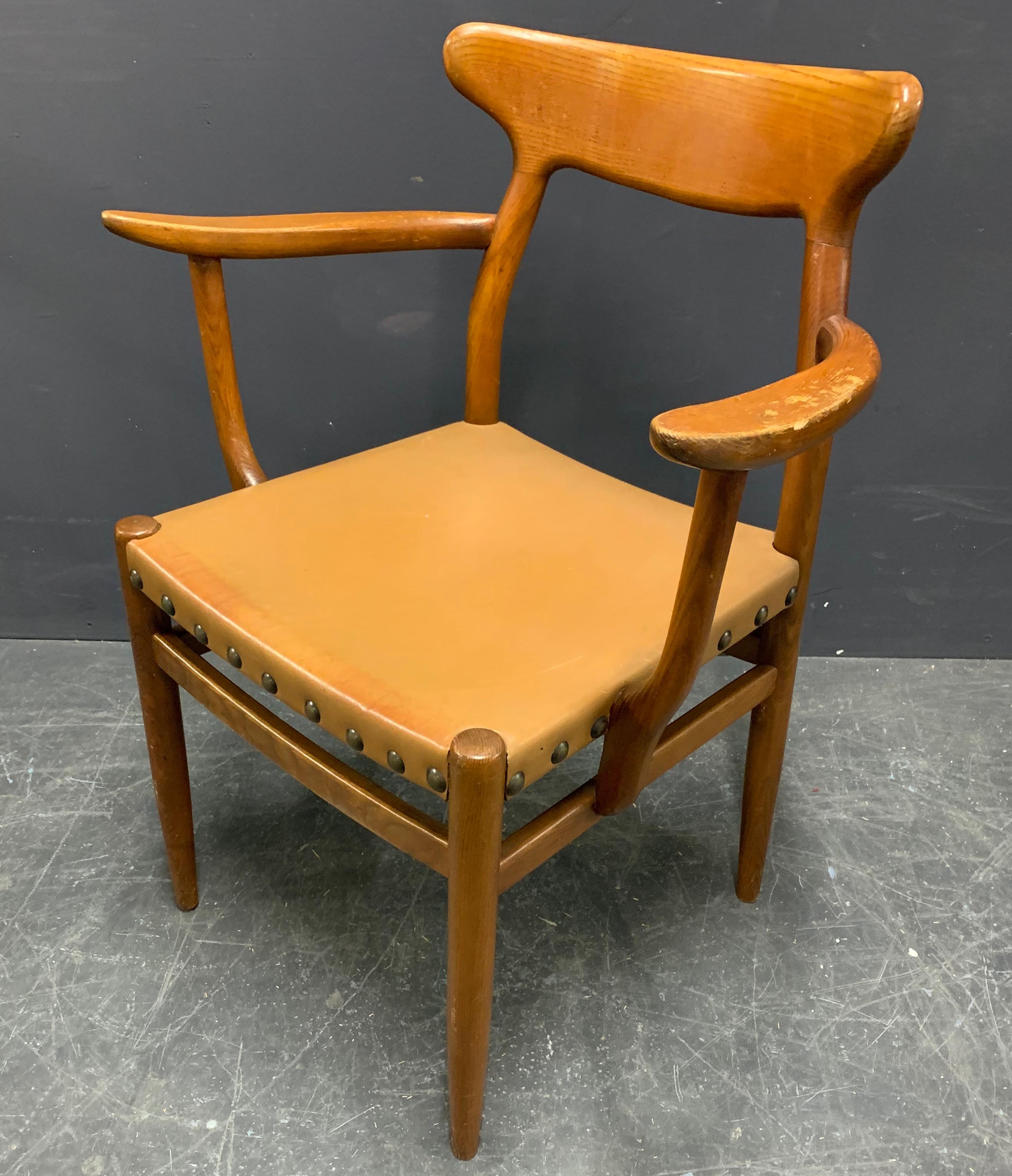 Attributed to guillerme et chambron. All chairs are handmade and the seats are upholstered in saddle leather. 6 sidechairs also available.