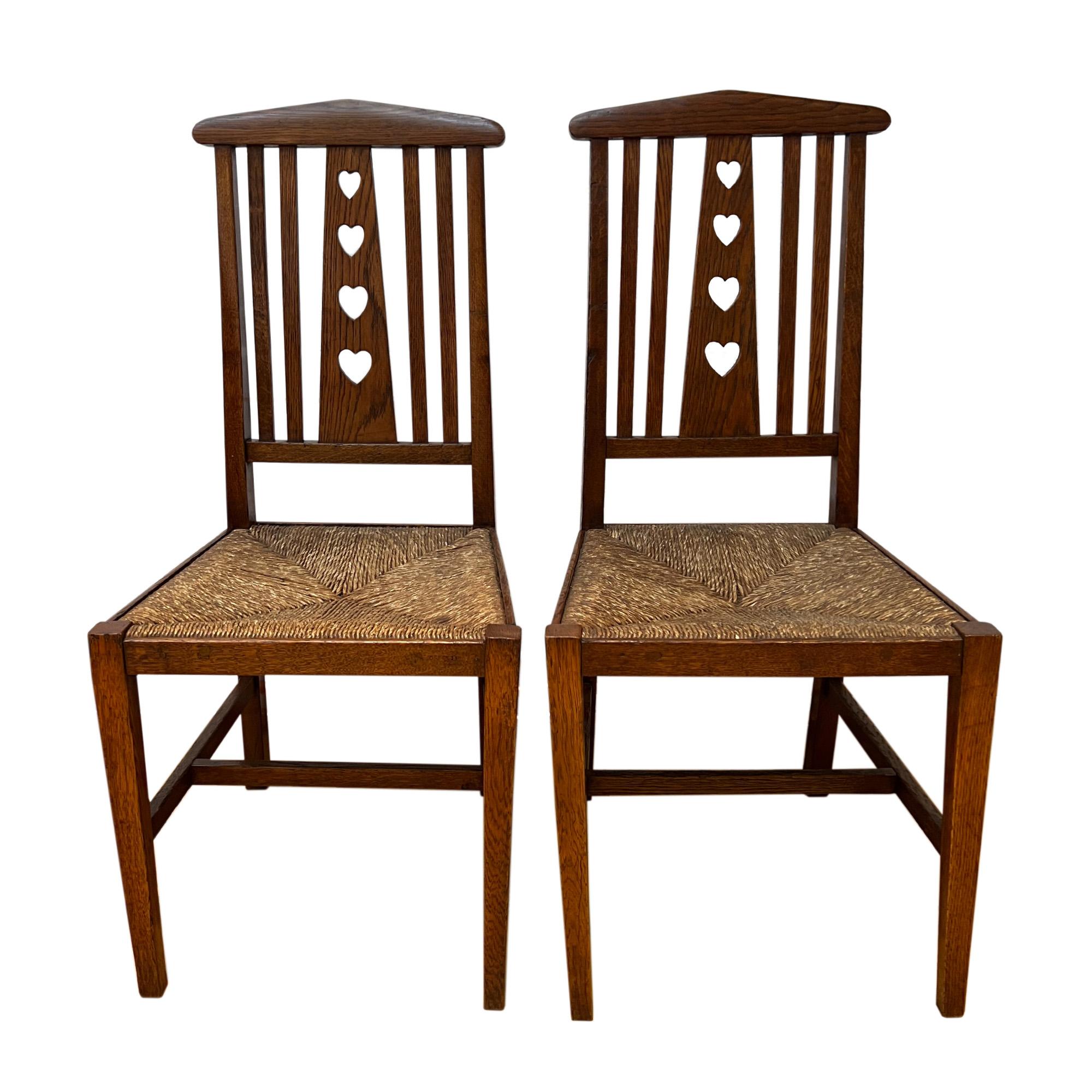 British Set of 4 Dining Chairs, Art and Crafts With Heart Detail For Sale