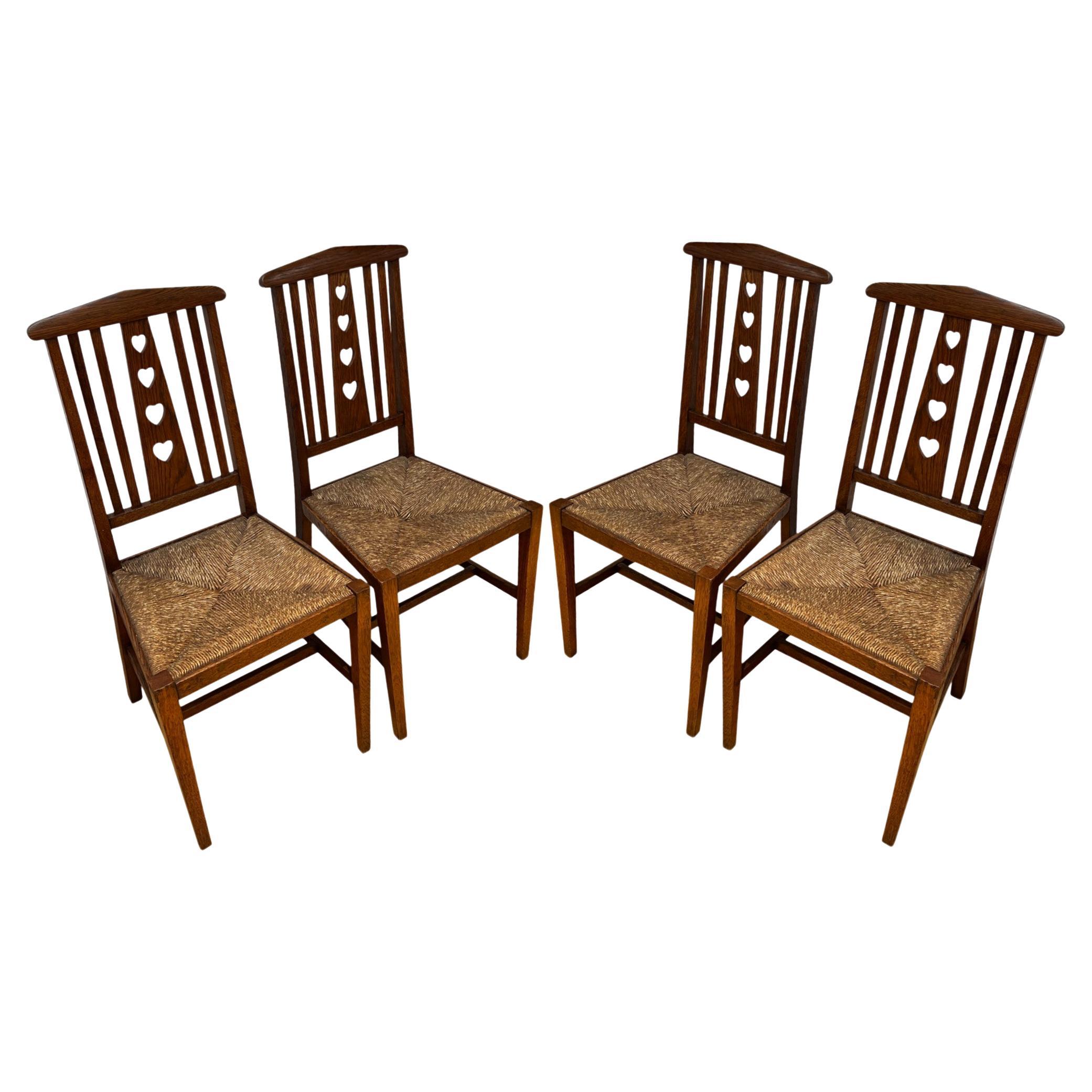 Set of 4 Dining Chairs, Art and Crafts With Heart Detail For Sale