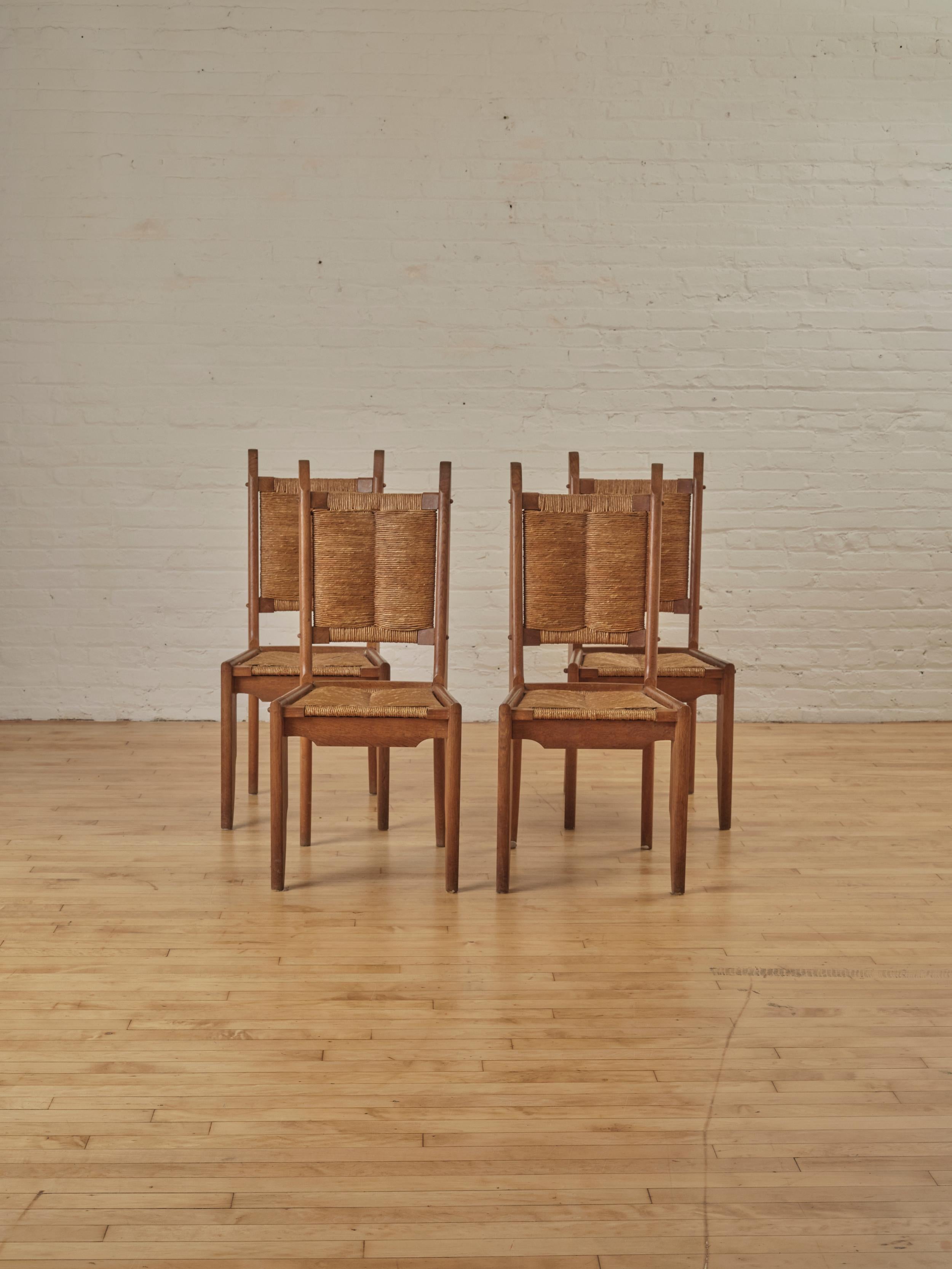 Mid-Century Modern Set of 4 Dining Chairs by Guillerme and Chambron for Notre maison C. 1950's For Sale