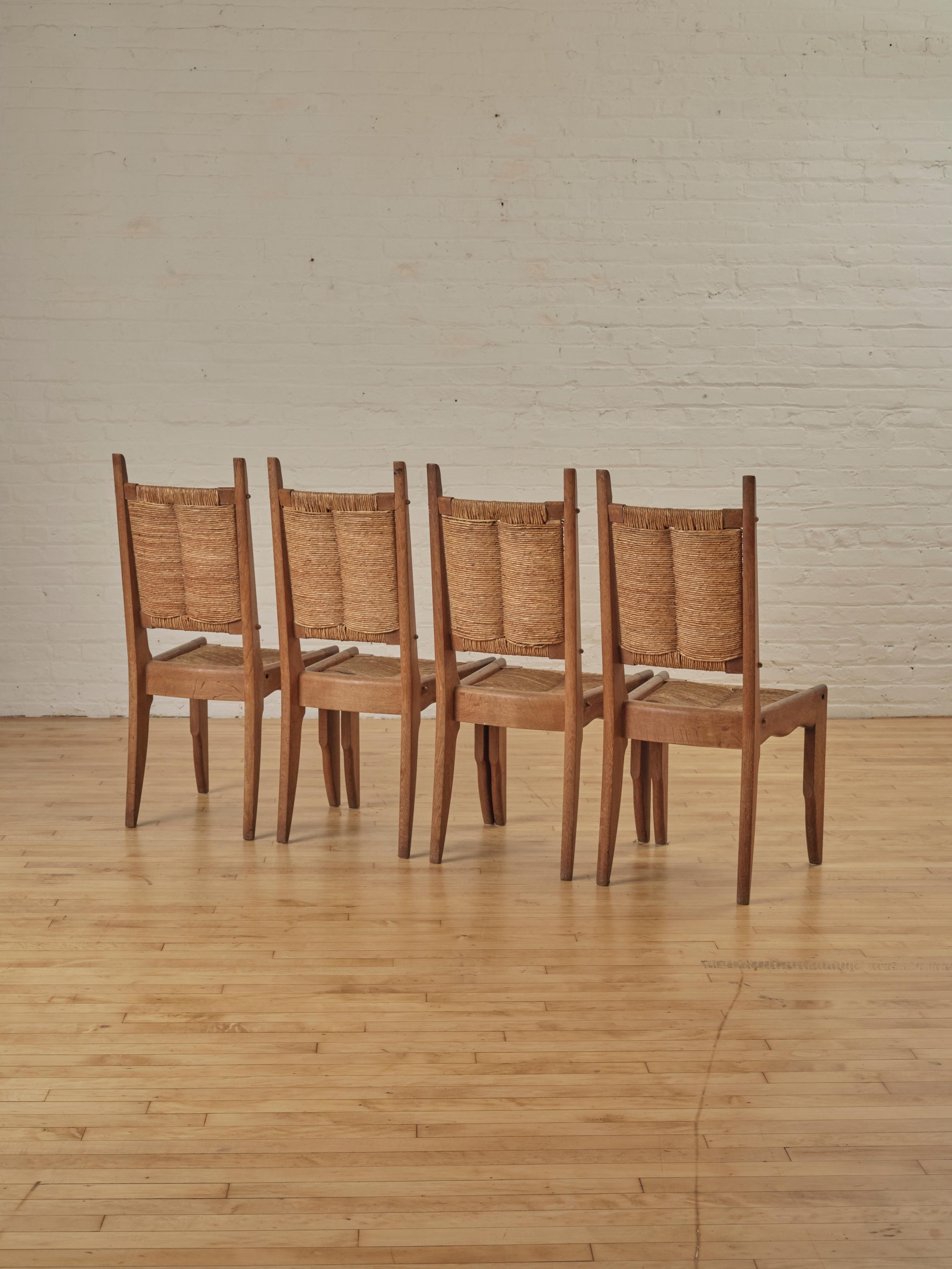 Set of 4 Dining Chairs by Guillerme and Chambron for Notre maison C. 1950's In Good Condition For Sale In Long Island City, NY