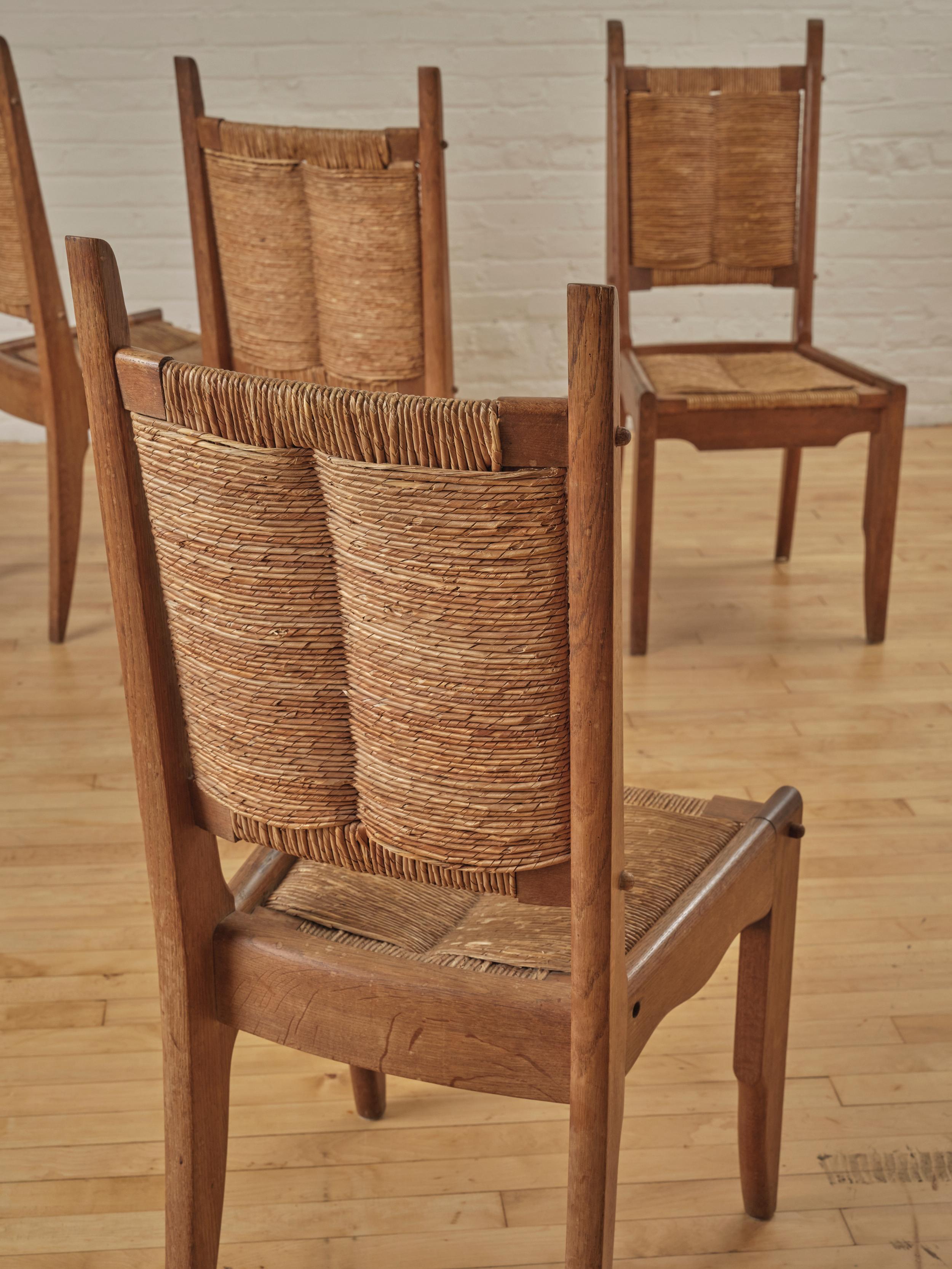 20th Century Set of 4 Dining Chairs by Guillerme and Chambron for Notre maison C. 1950's For Sale