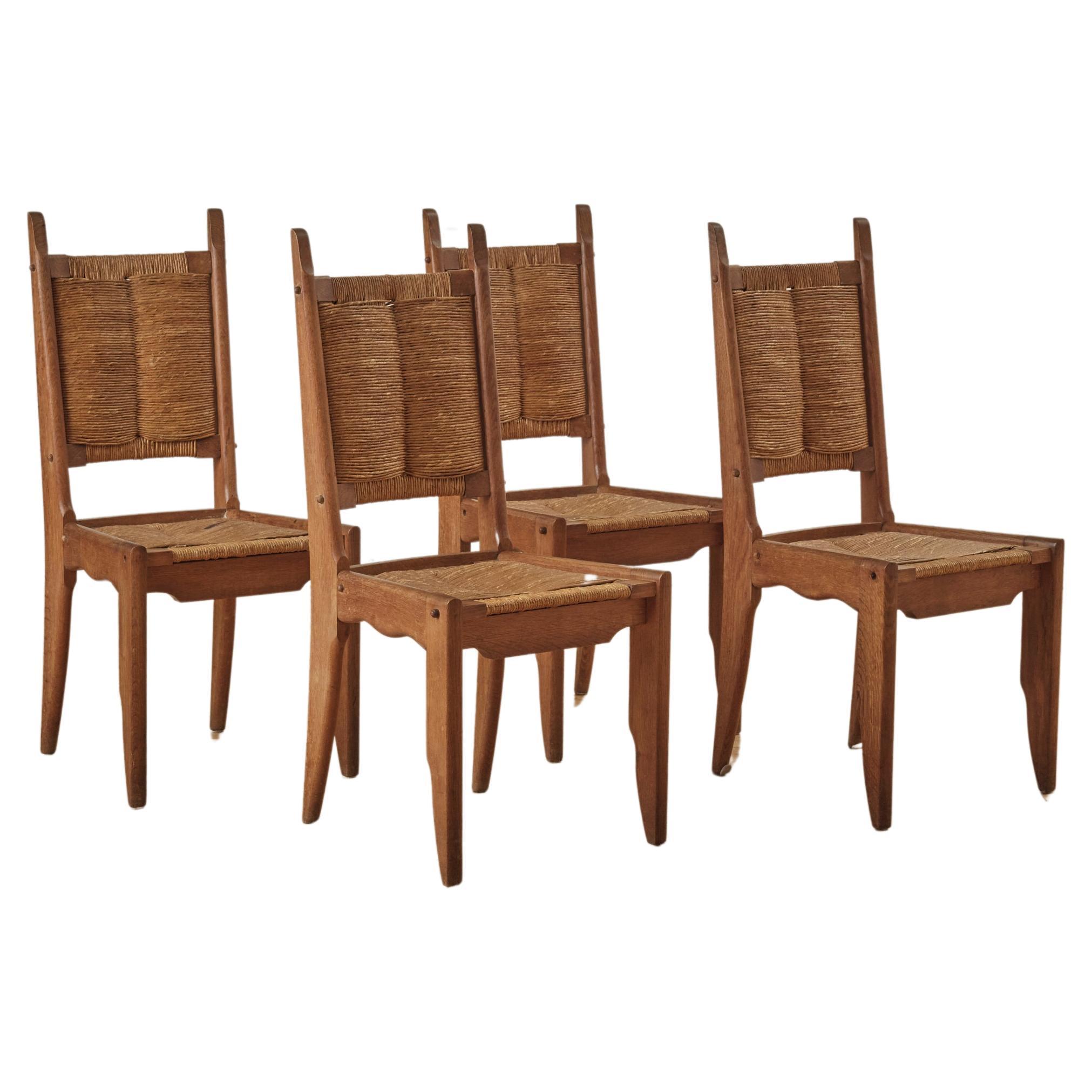 Set of 4 Dining Chairs by Guillerme and Chambron for Notre maison C. 1950's For Sale
