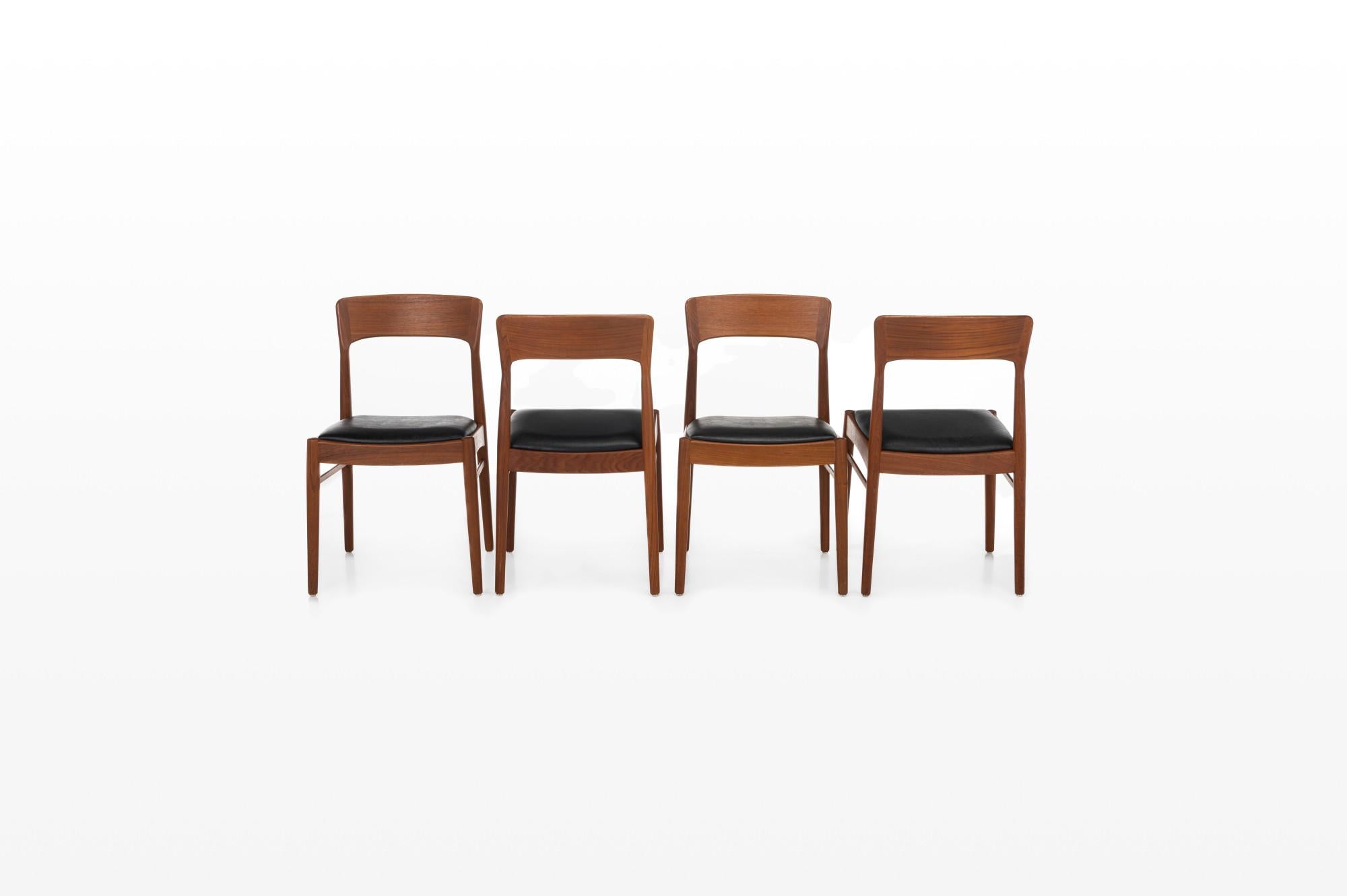 Set of four dining chairs in teak, designed by Henning Kjærnulf for Korup Stølefabrik in Denmark in the 1960s. The chairs still have the original black seats.